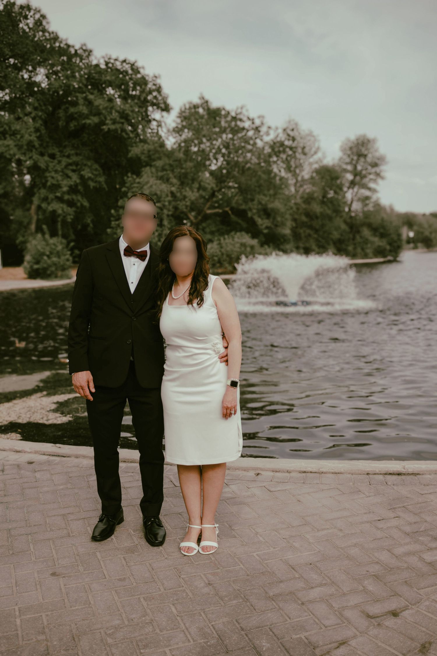 couple posing in a garden