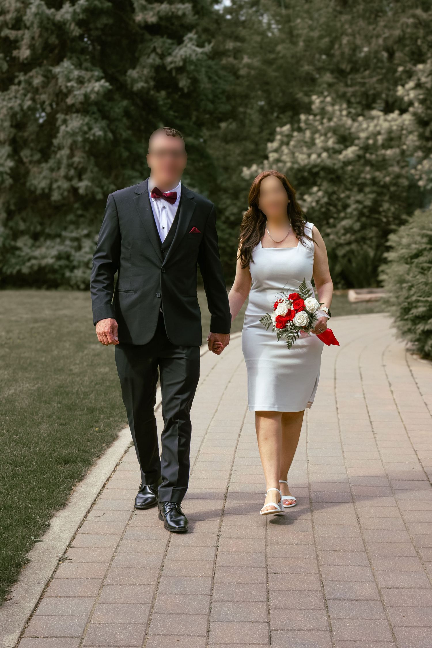 couple posing in a garden