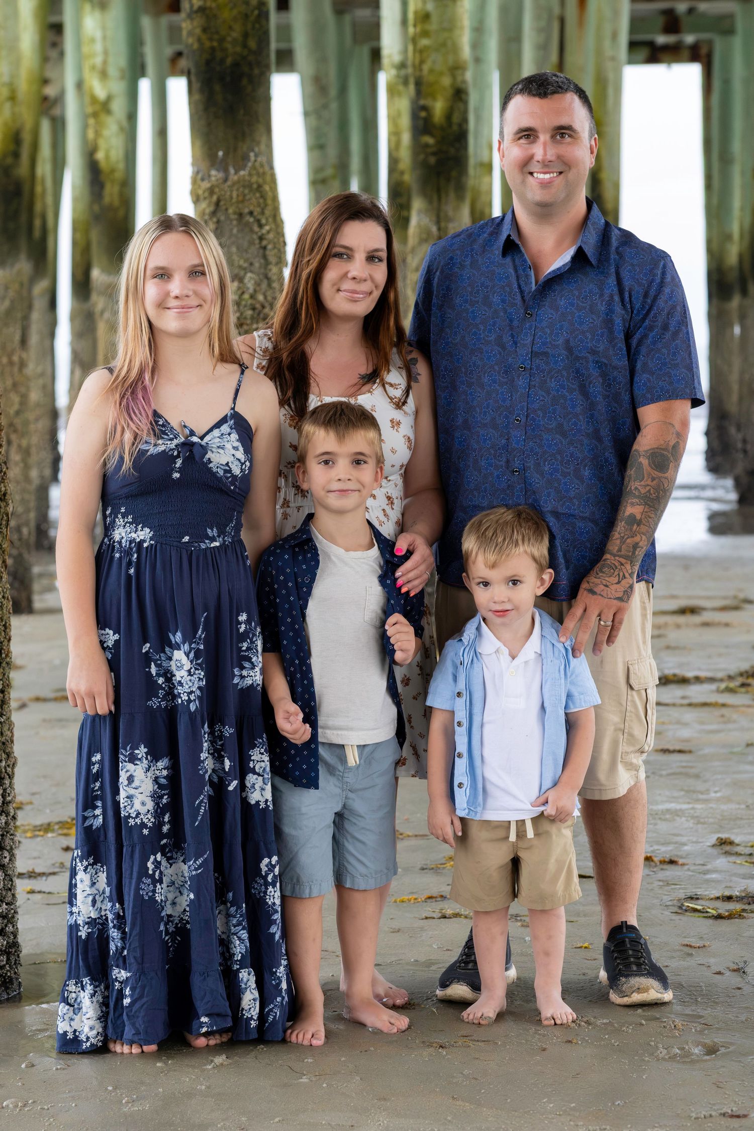 Family photo under the old orchard beach pier