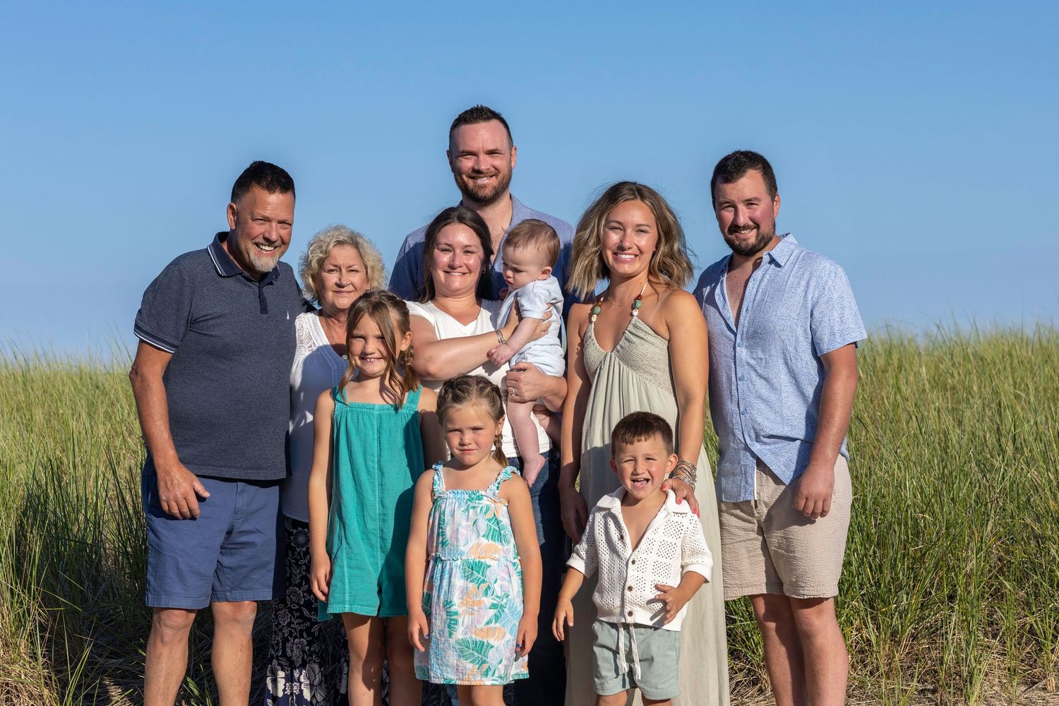 Family Photo in Old Orchard Beach in front of dune grass