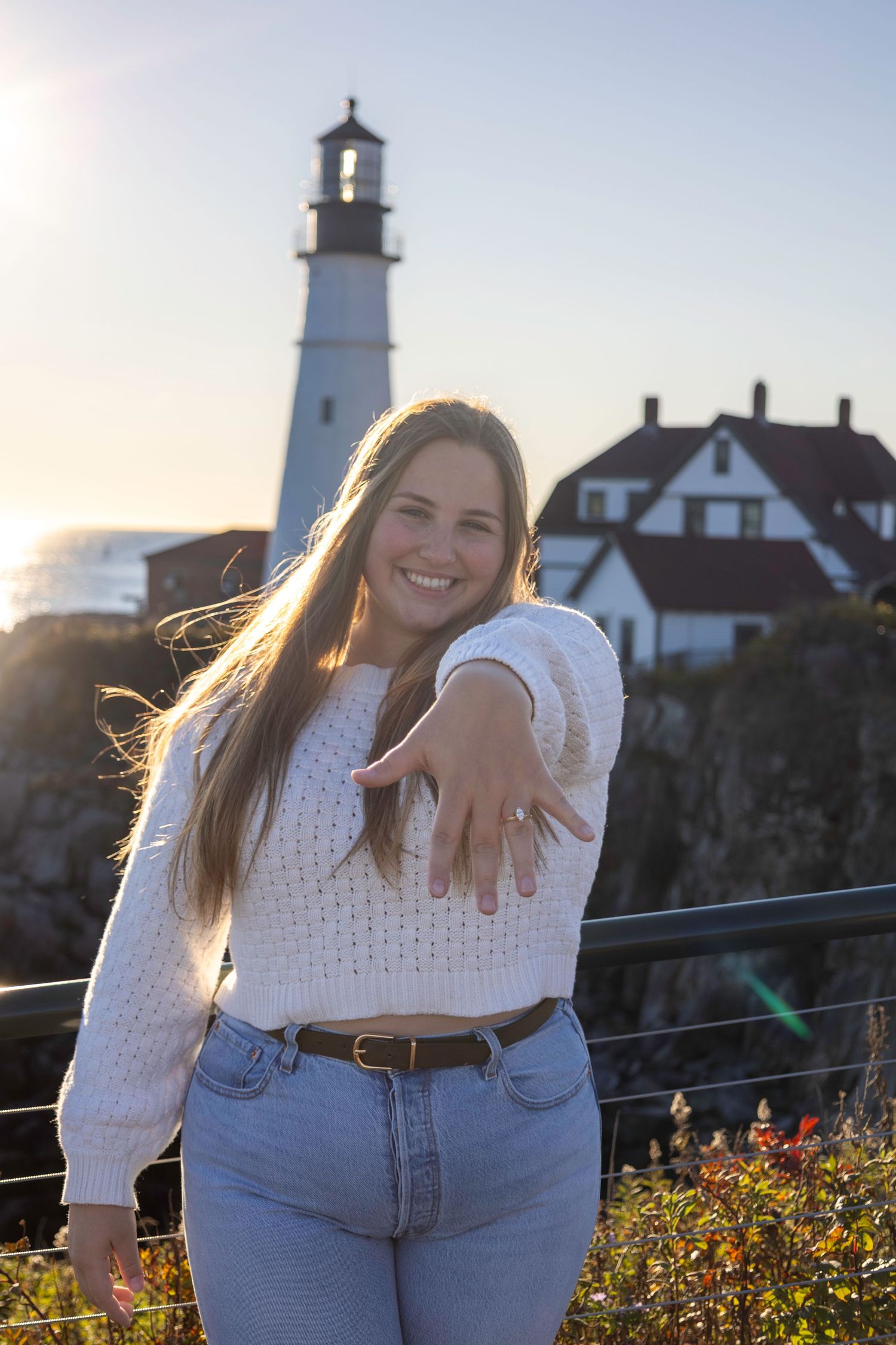 girl holding out her ring hand