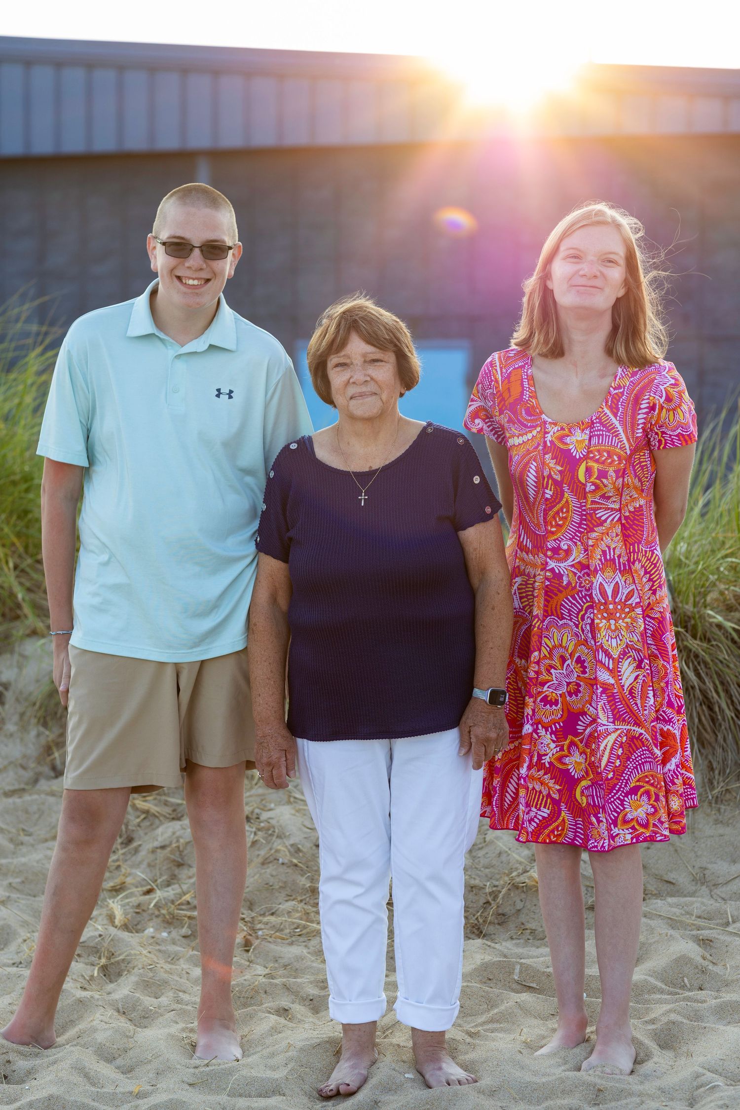 Family photo with the sun peaking behind