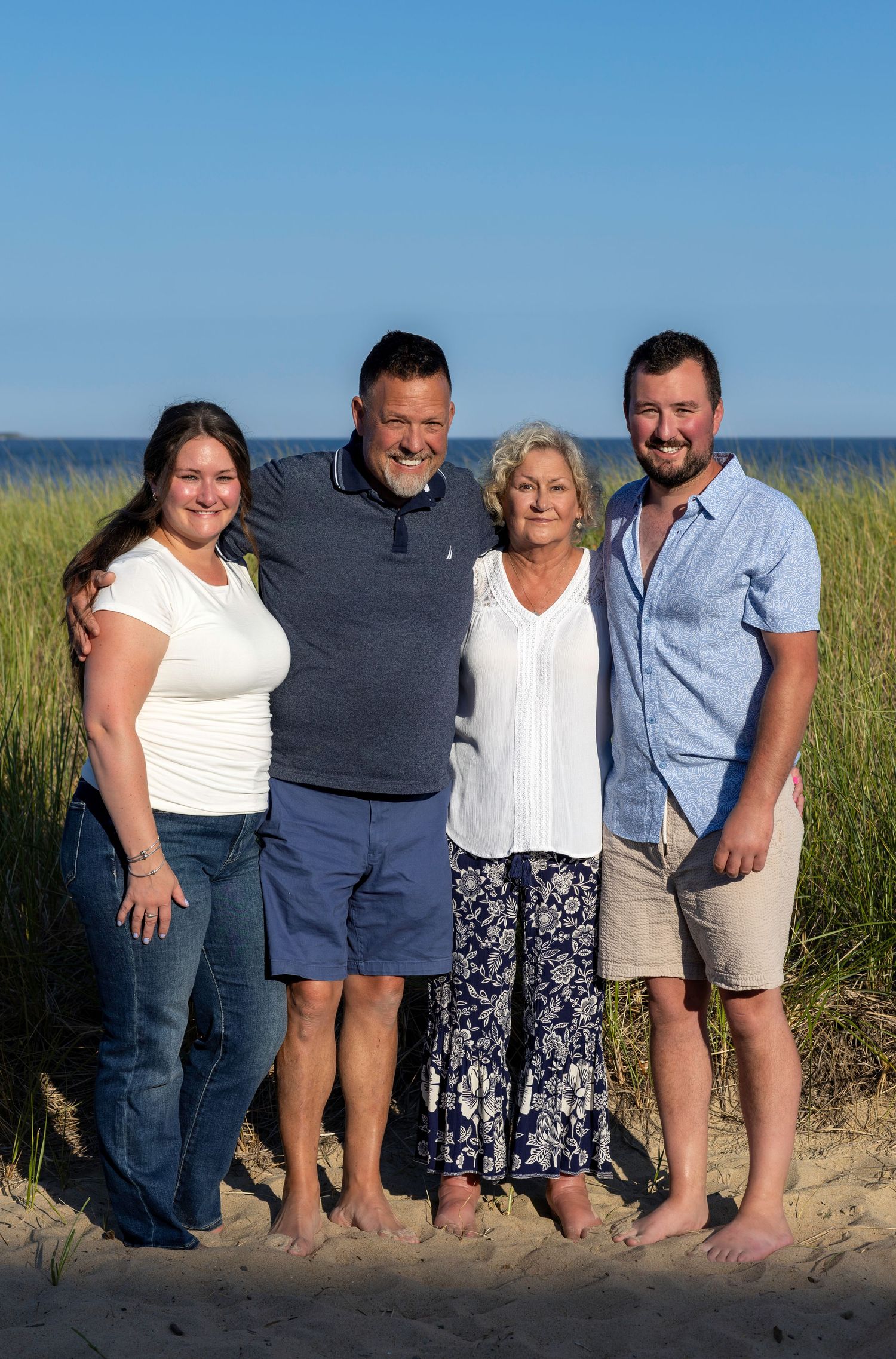 Family Photo in Old Orchard Beach in front of dune grass