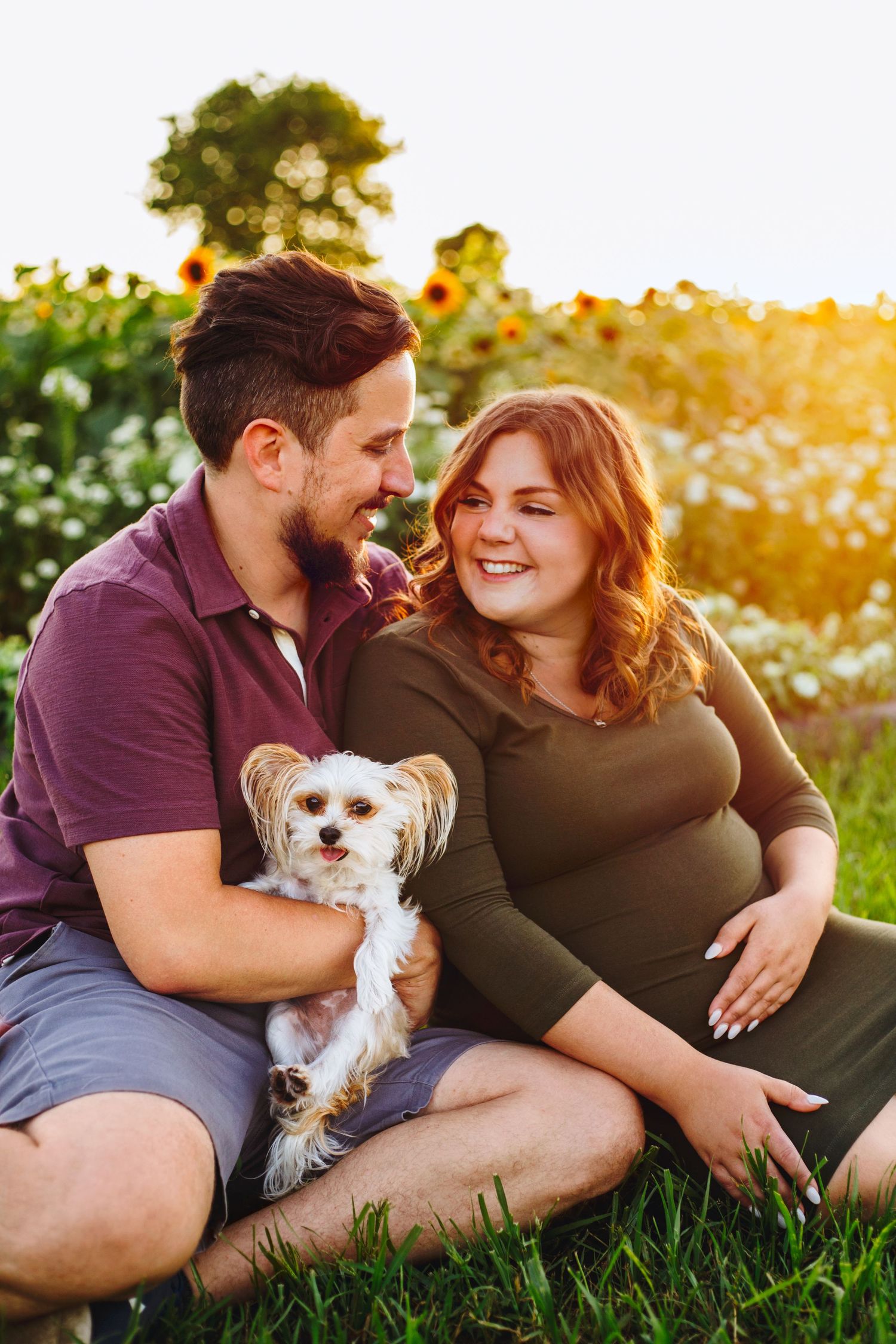 Expectant couple enjoying a natural maternity photography session at La Belle in Coteau-du-Lac