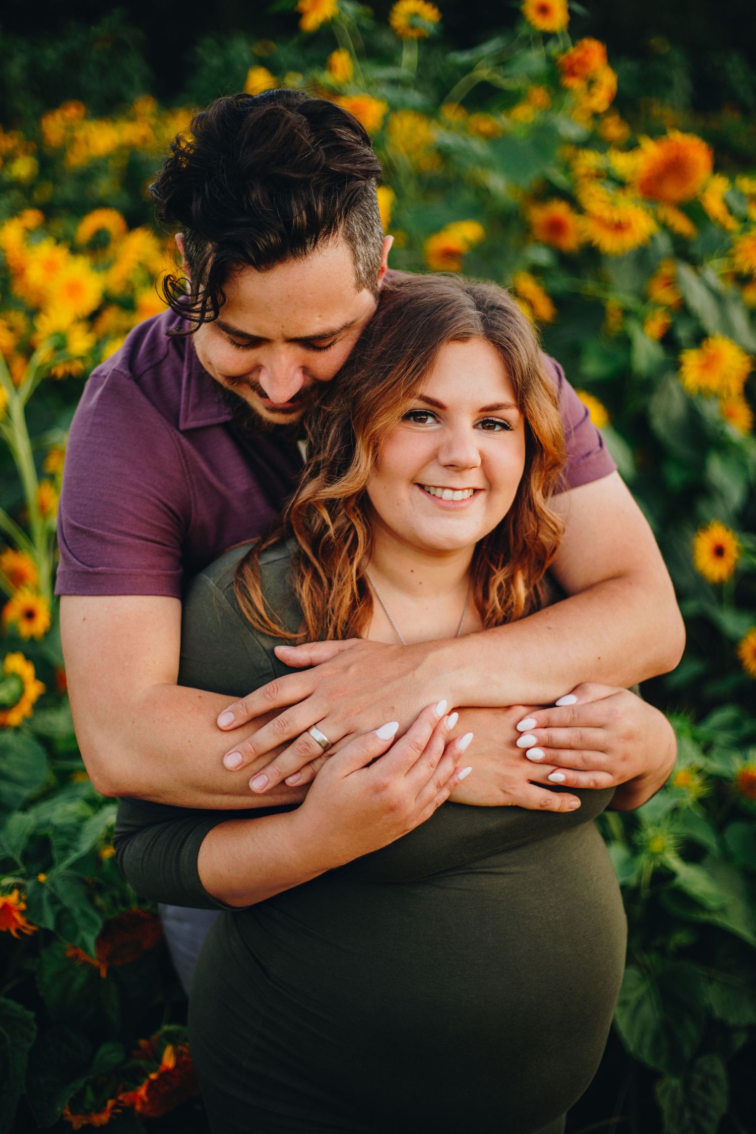 Expectant couple enjoying a natural maternity photography session at La Belle in Coteau-du-Lac