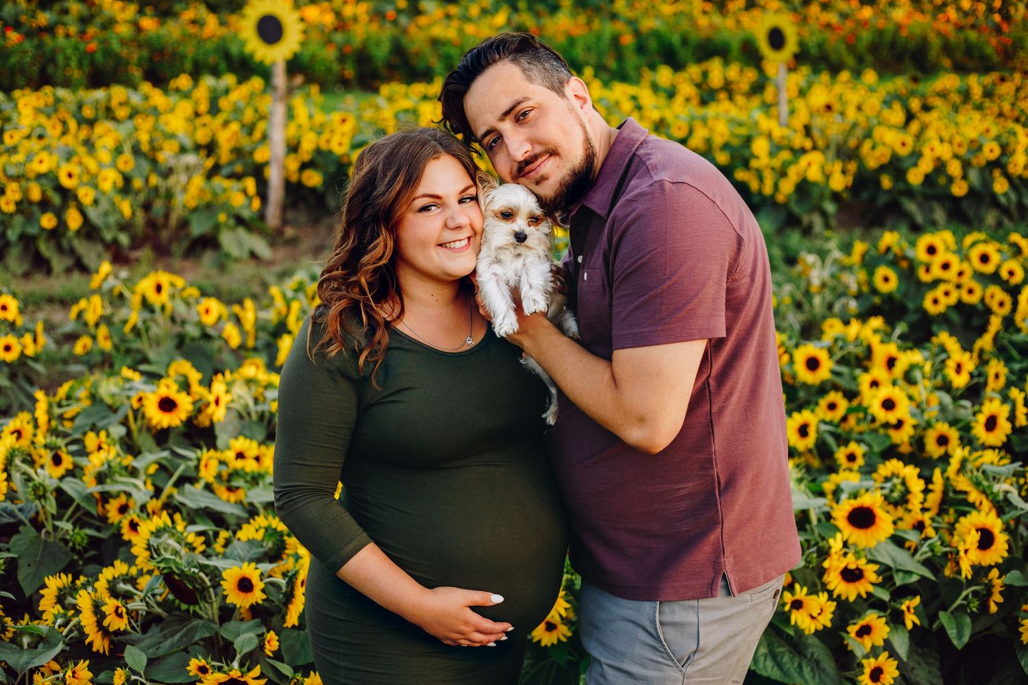 Expectant couple enjoying a natural maternity photography session at La Belle in Coteau-du-Lac