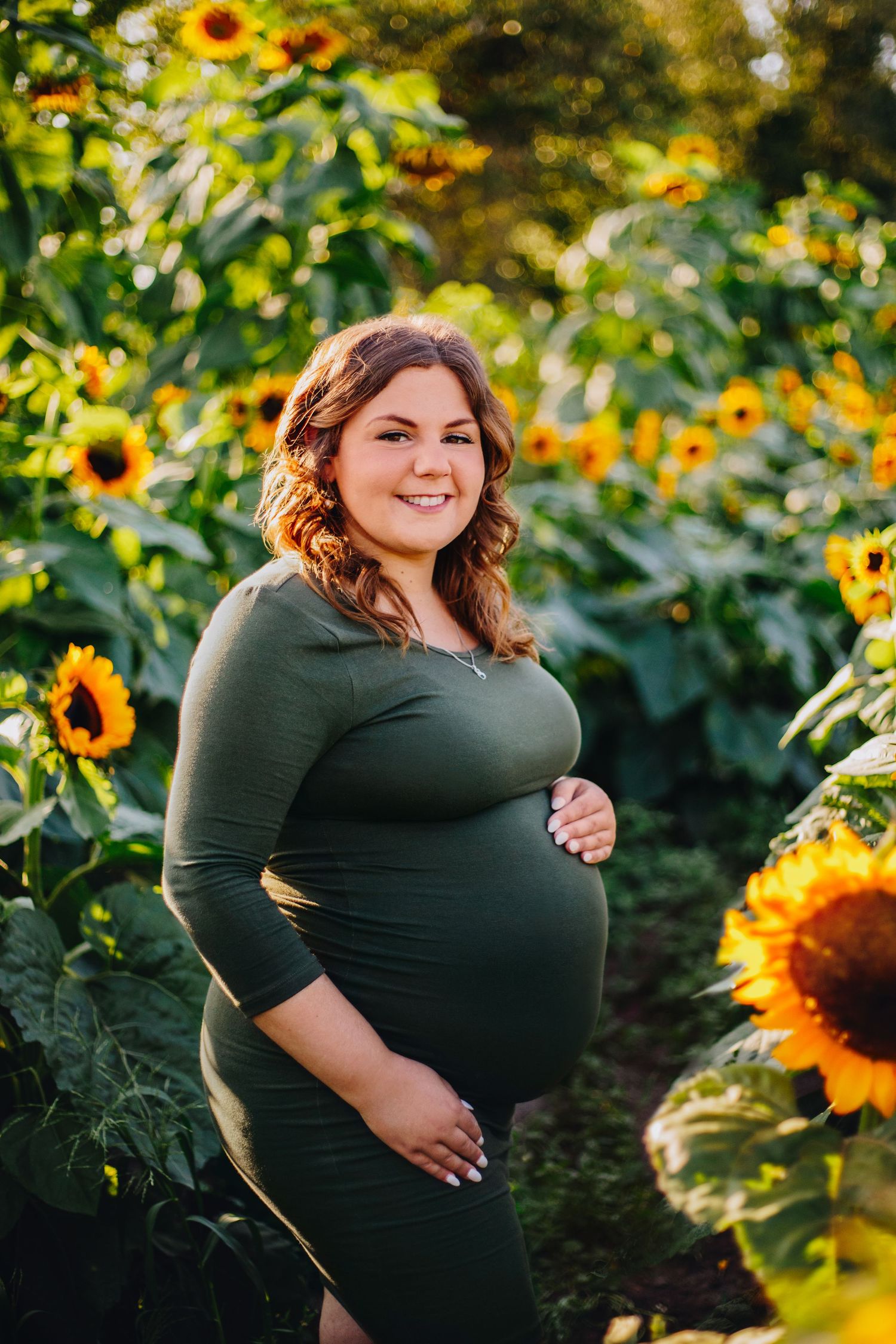 Expectant mother enjoying a natural maternity photography session at La Belle in Coteau-du-Lac