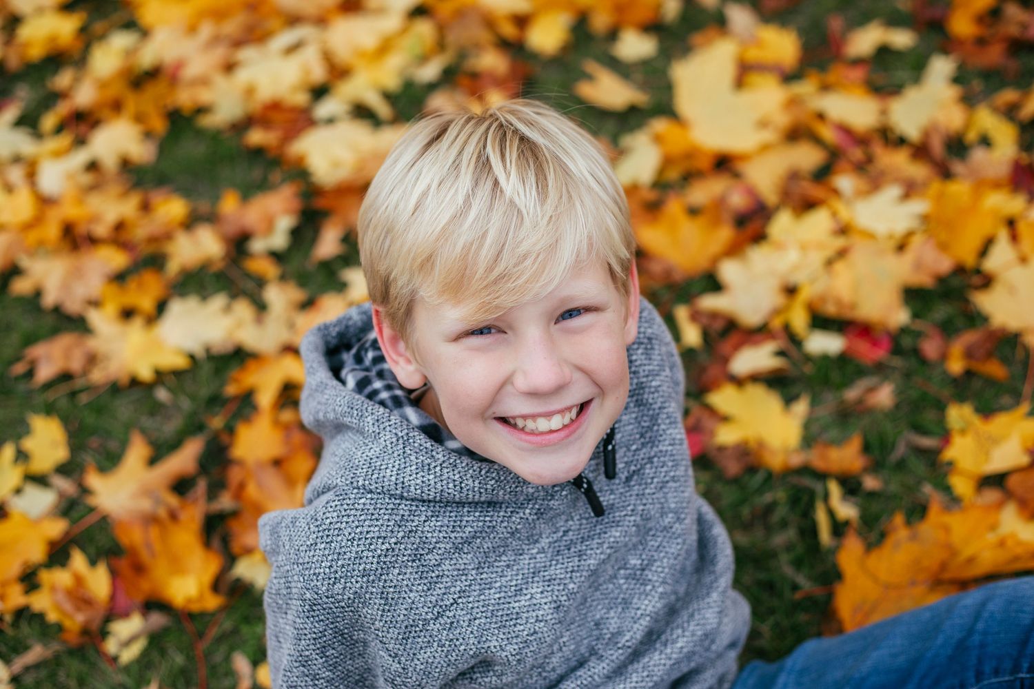 Child posing naturally during a family photography session in Île-Perrot