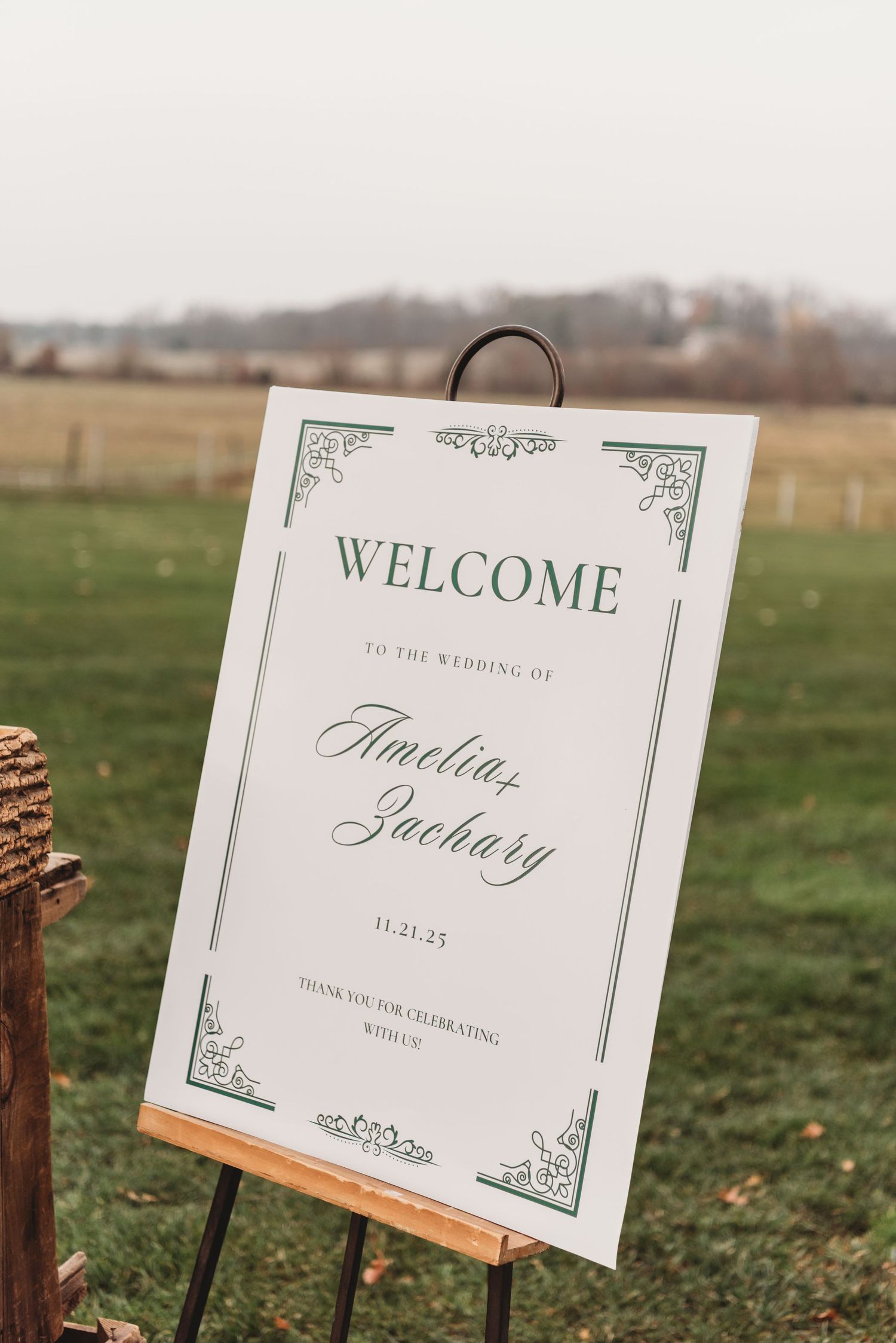 Elegant wedding welcome sign for Amelia and Zachary on November 21, 2025, displayed on a wooden easel.