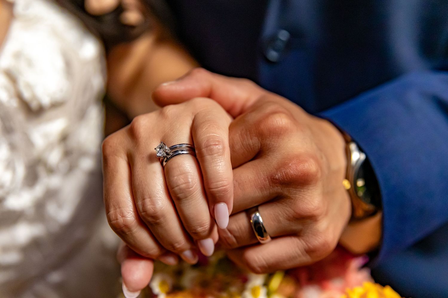Bride and groom holding hands after wedding ceremony at the Historic Pima County Courthouse in Tucson Arizona