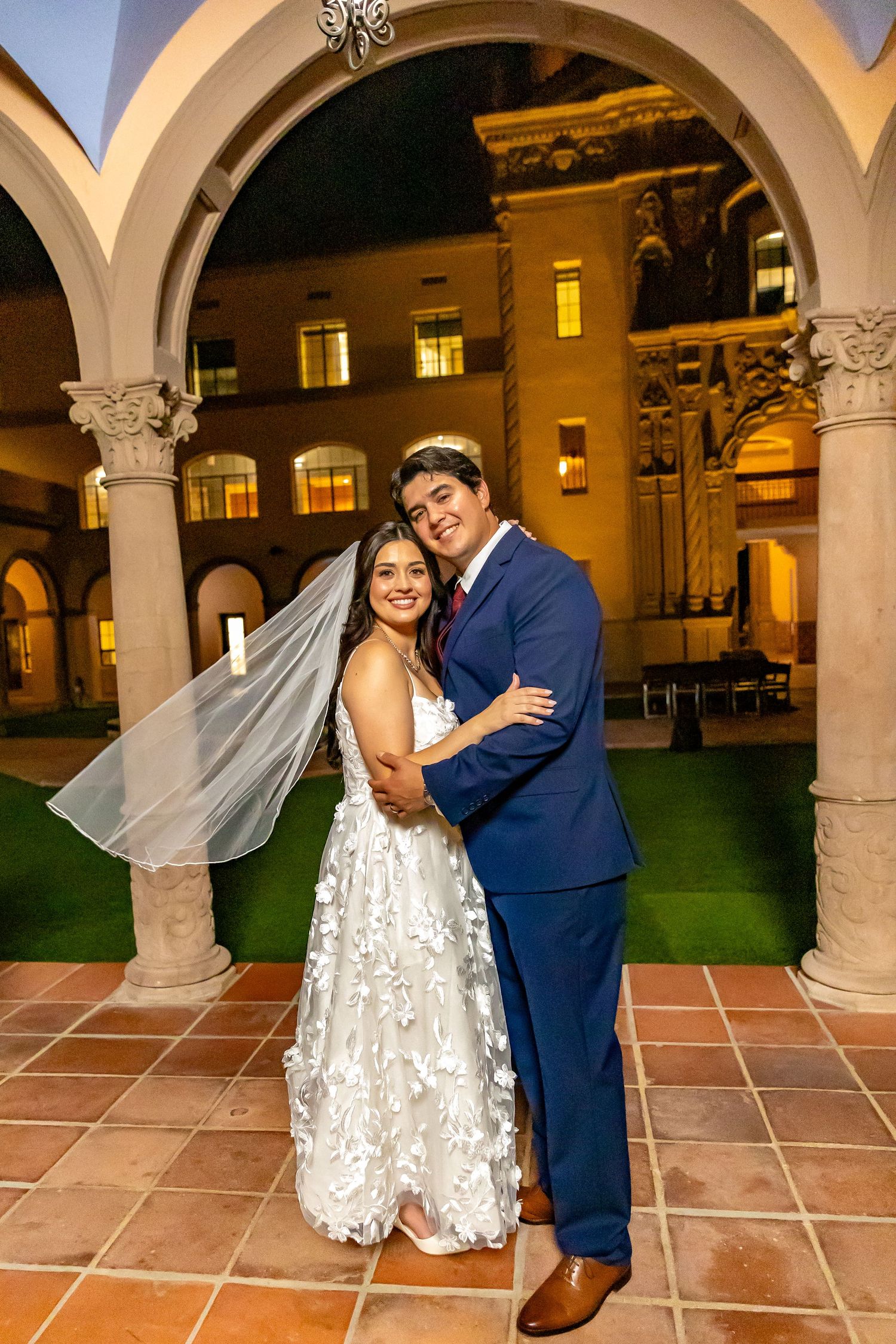 Newlywed couple outside the Historic Pima County Courthouse