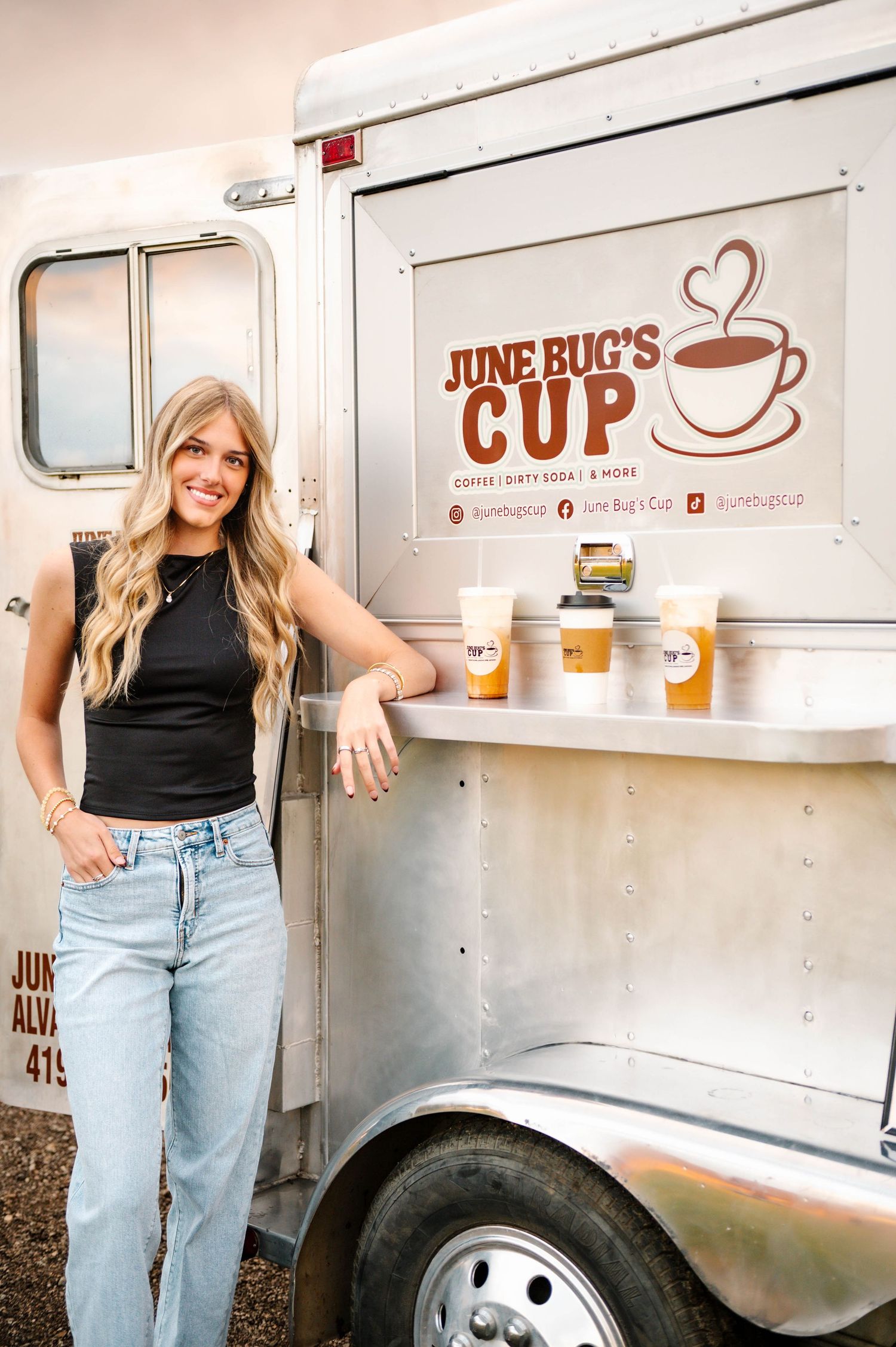 Coffee truck exterior showing June Bug's Cup branding and service window.