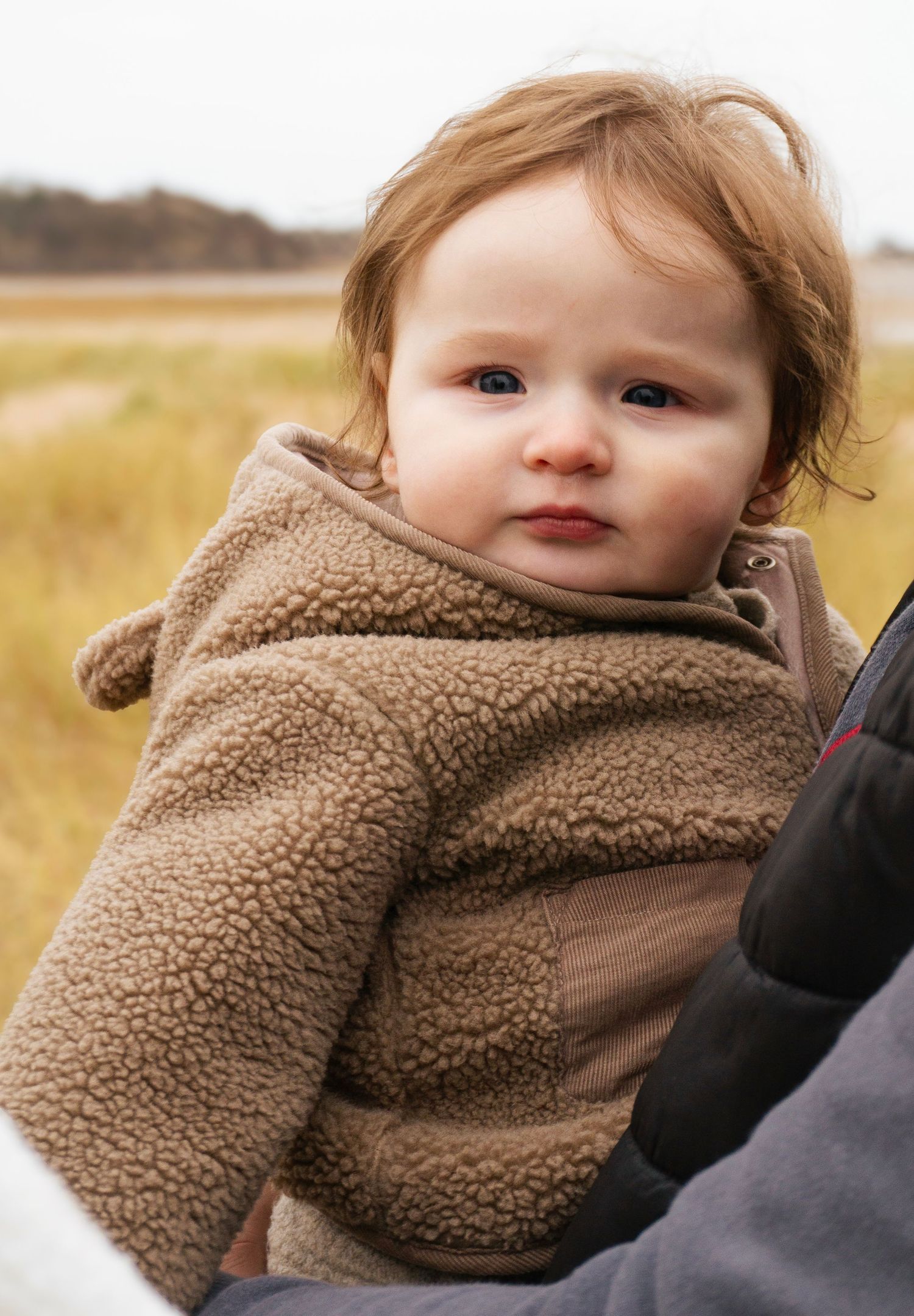 candid photo of baby during a warm, natural lifestyle photoshoot