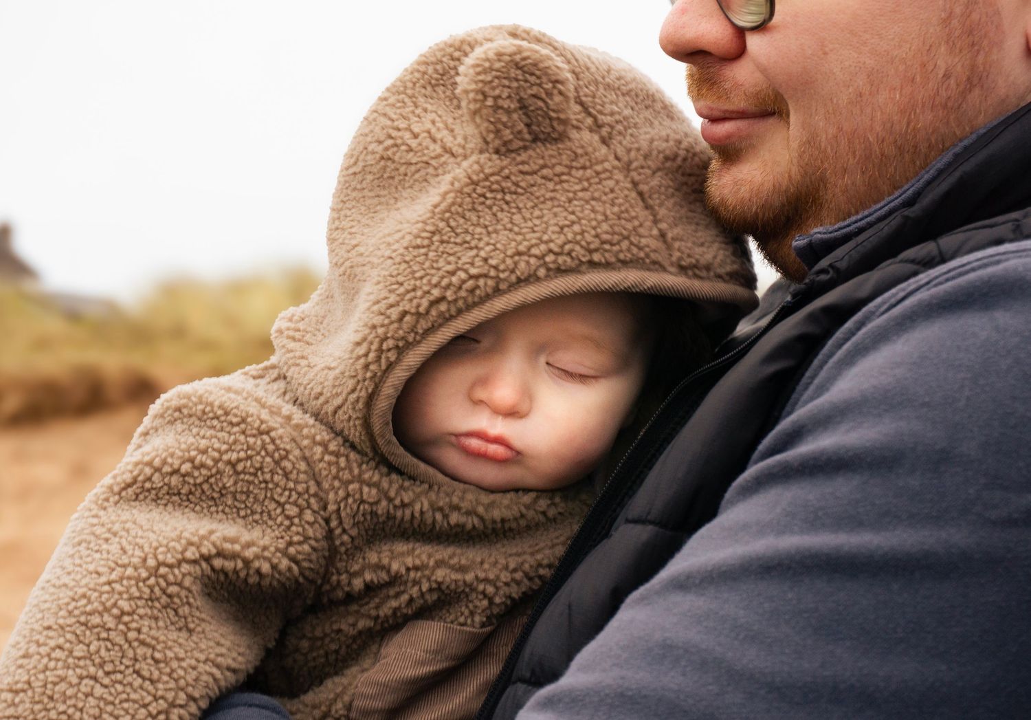 Baby sleeping during a warm, natural lifestyle photoshoot