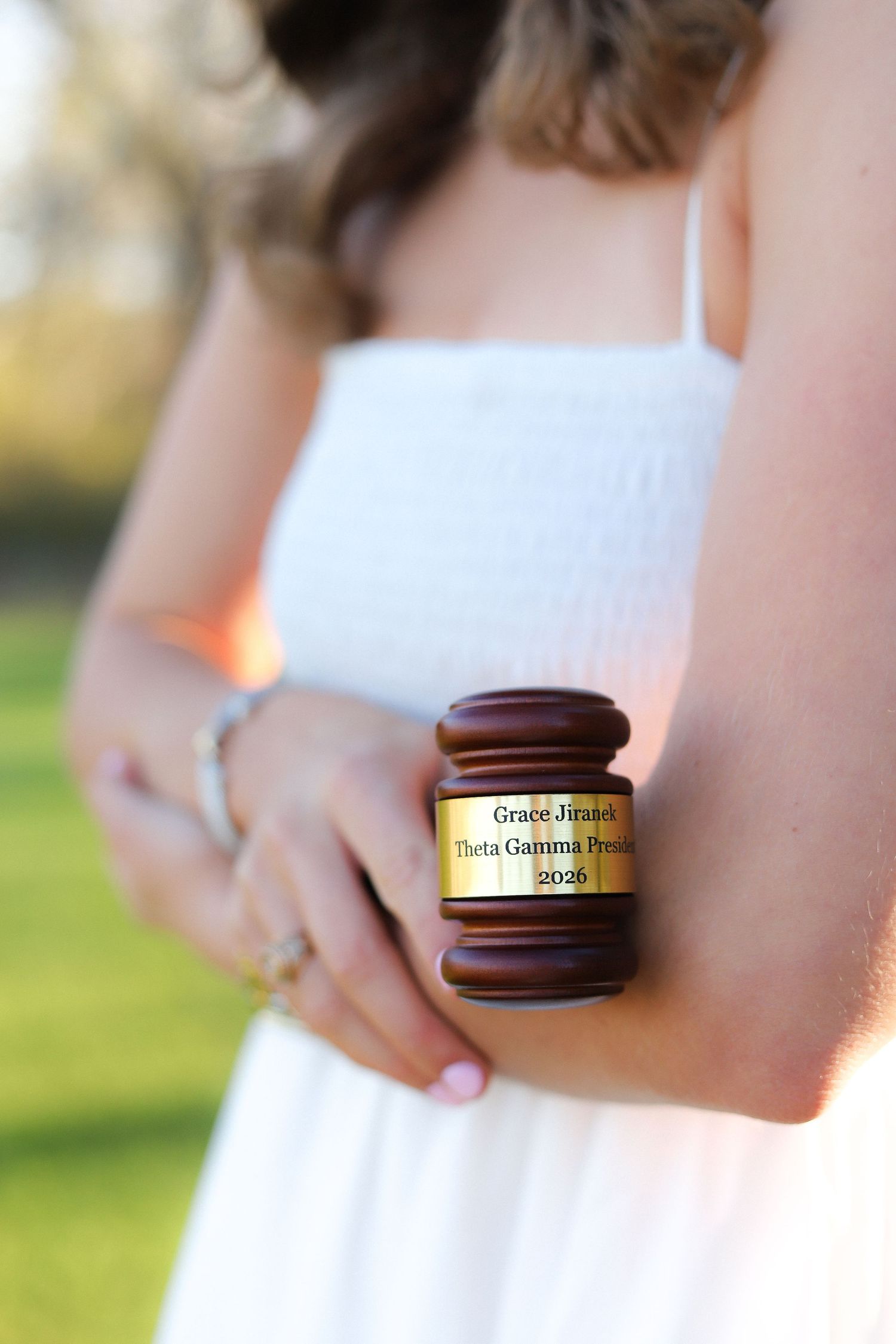 Close-up shots of hands holding jars and containers in natural outdoor lighting.