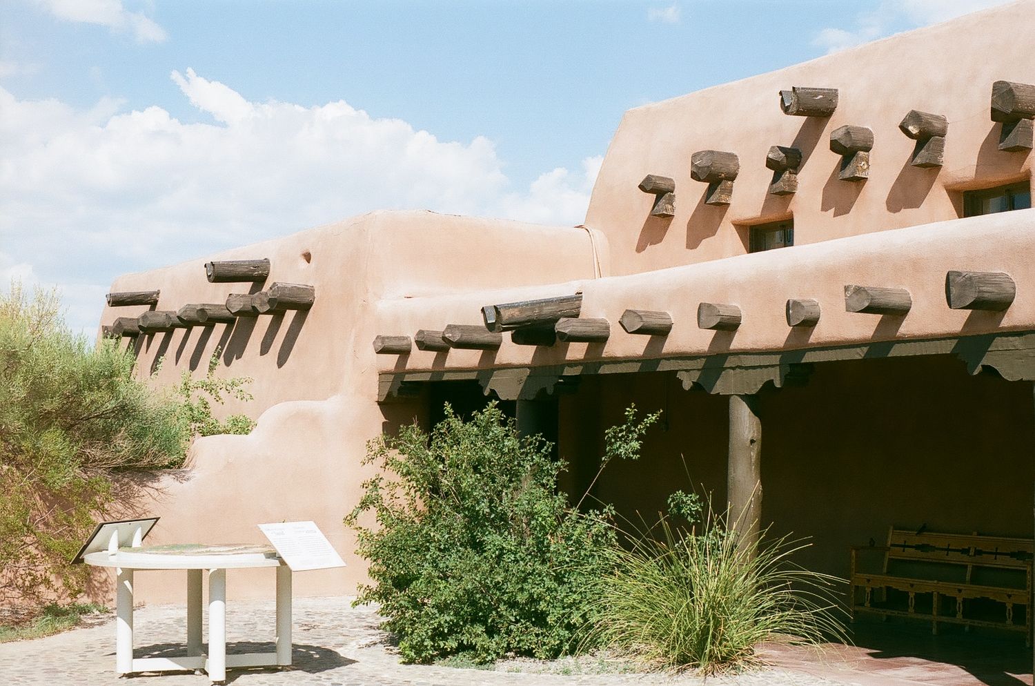 Adobe-style building with traditional southwestern architecture and desert landscaping.
