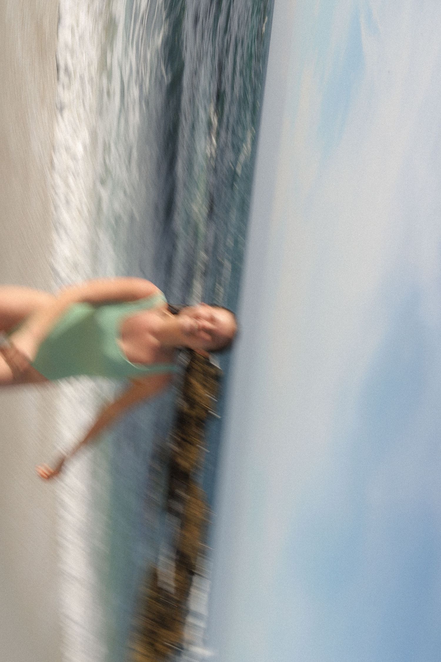 Series of tilted beach photos showing waves and ocean horizon from different artistic angles.
