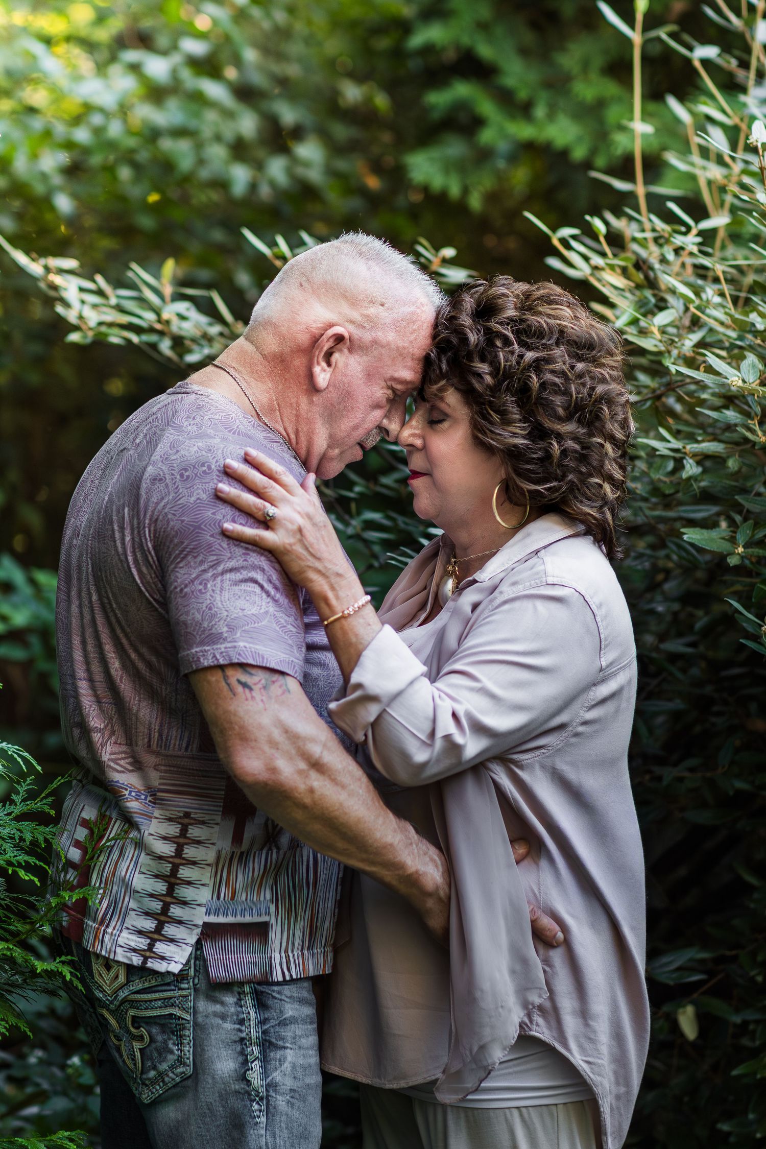 Emotional moment between husband and wife during a Murfreesboro couples photography session.