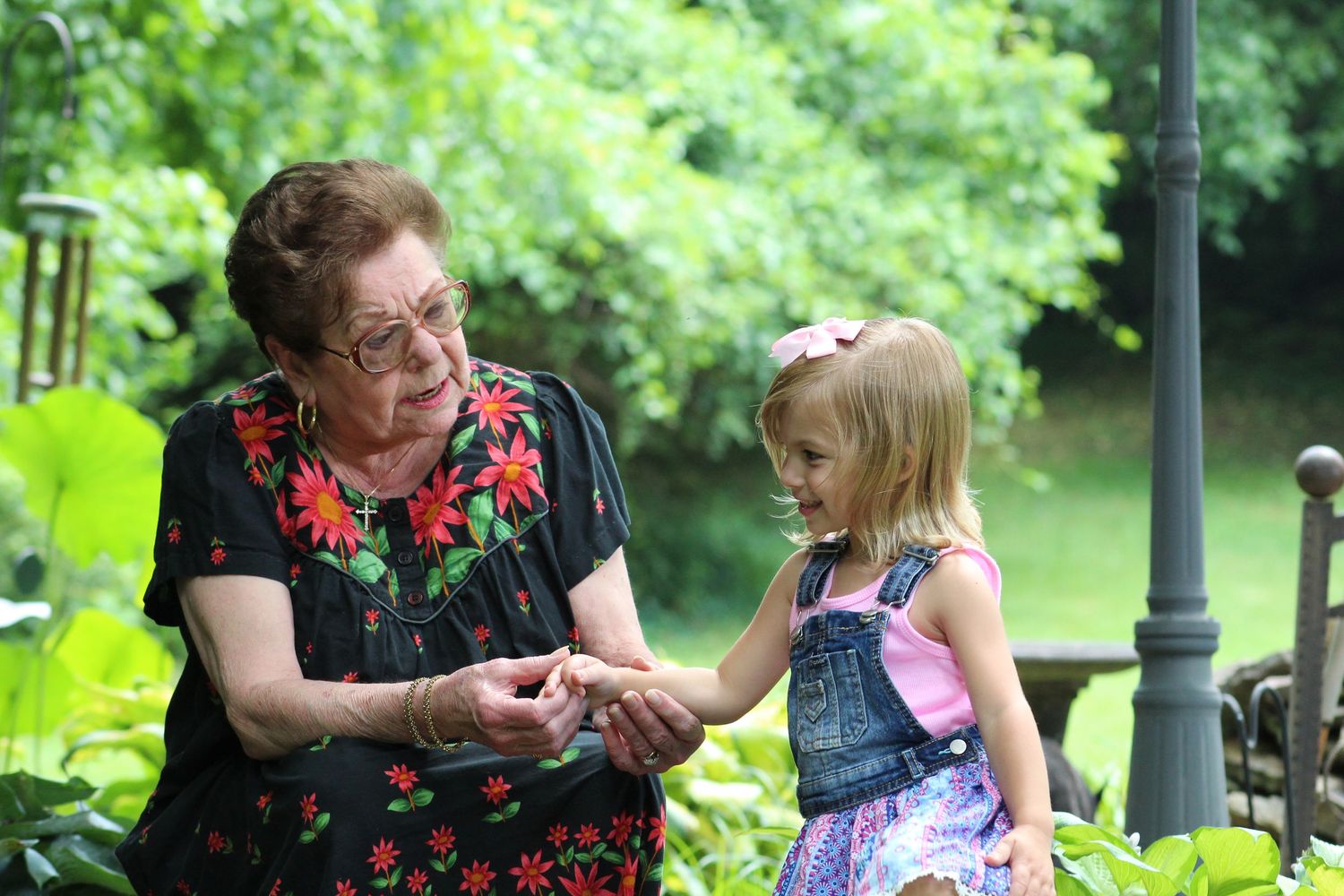 Multi-generational family photography session in Murfreesboro Tennessee with grandmother and granddaughter outdoors