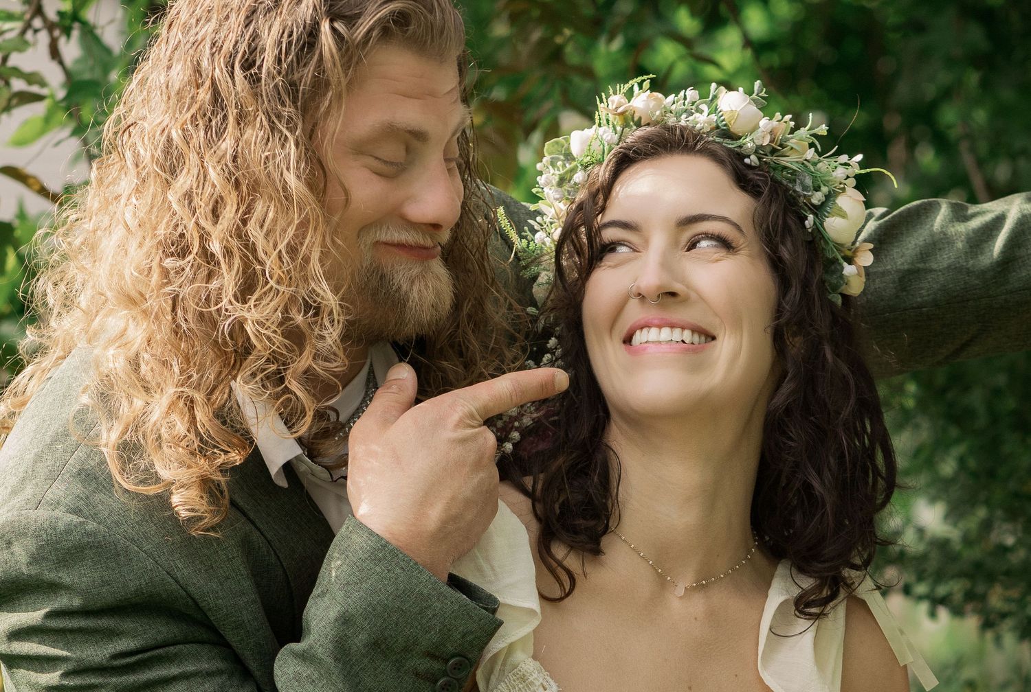 Joyful close-up portrait of a bride and groom smiling together during an intimate elopement in Murfreesboro, Tennessee surrounded by greener
