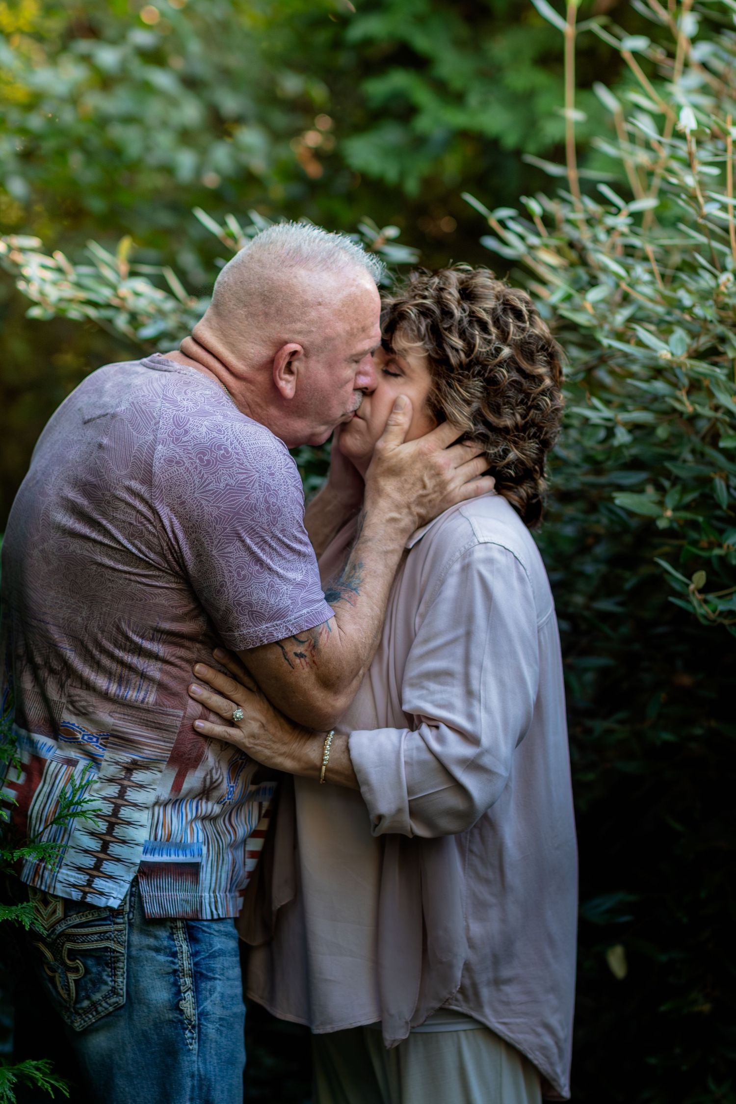 Couple sharing an intimate kiss during an outdoor couples photography session in Murfreesboro, Tennessee.