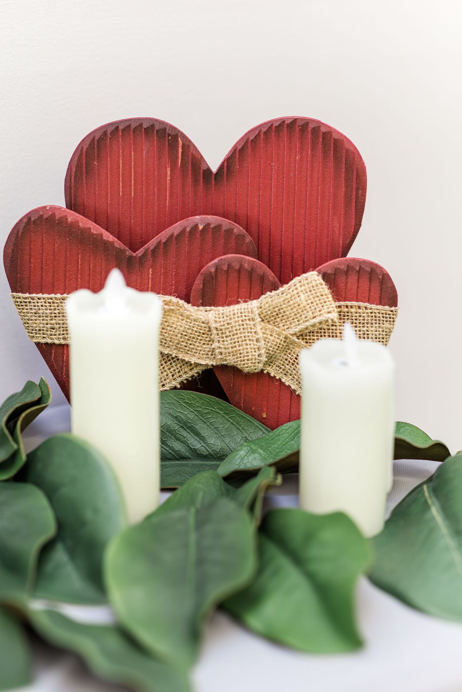 Candle and heart decor detail photographed during an intimate elopement ceremony in Murfreesboro, TN.