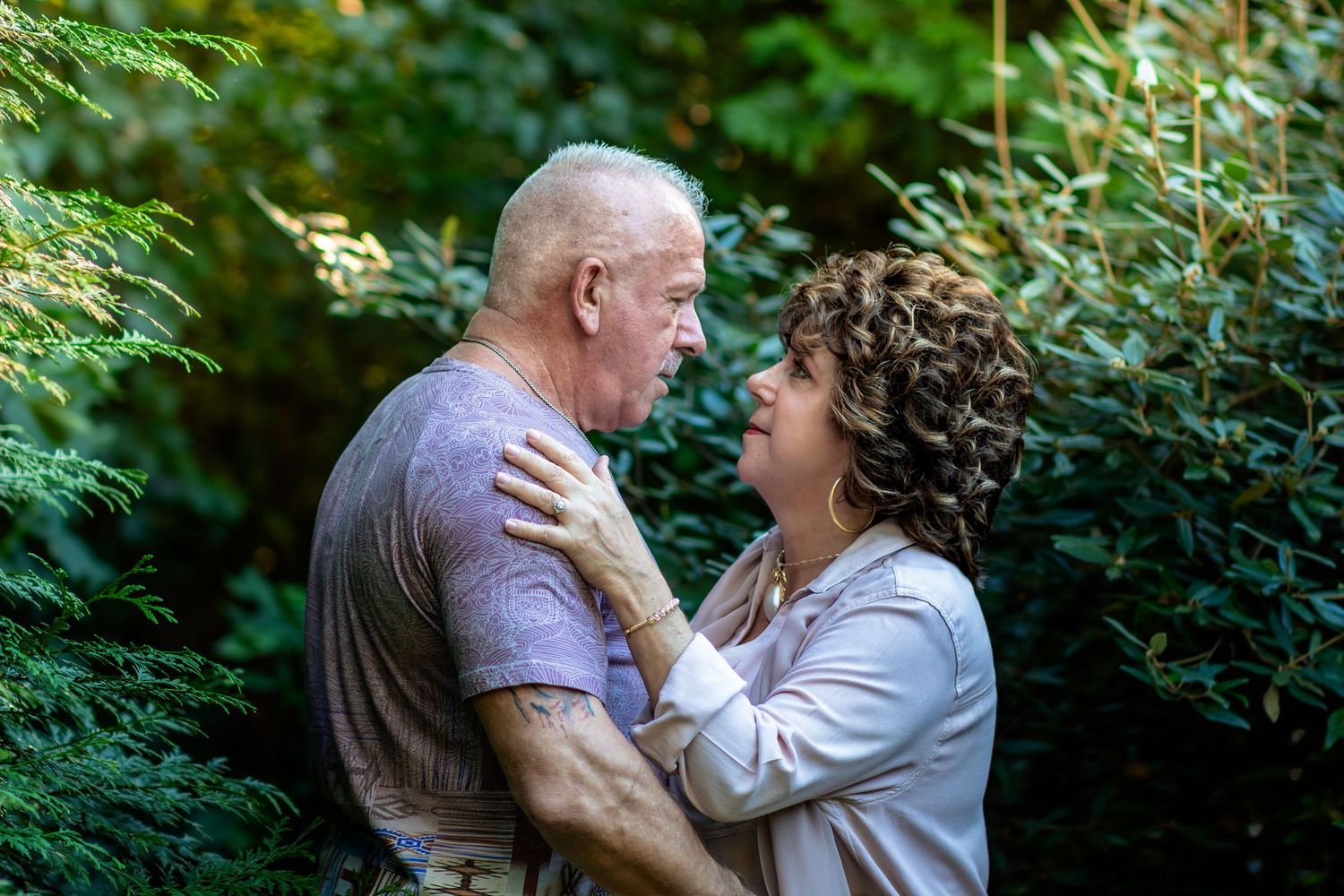 Couple standing close together during a natural couples session in Rutherford County.
