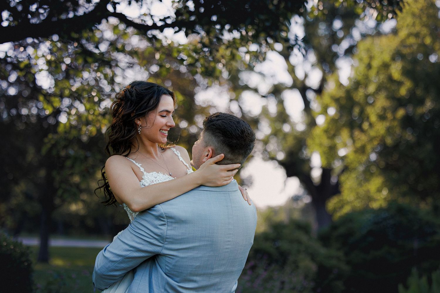 a fun image of a bride and groom on their wedding day in Kansas, candid photography