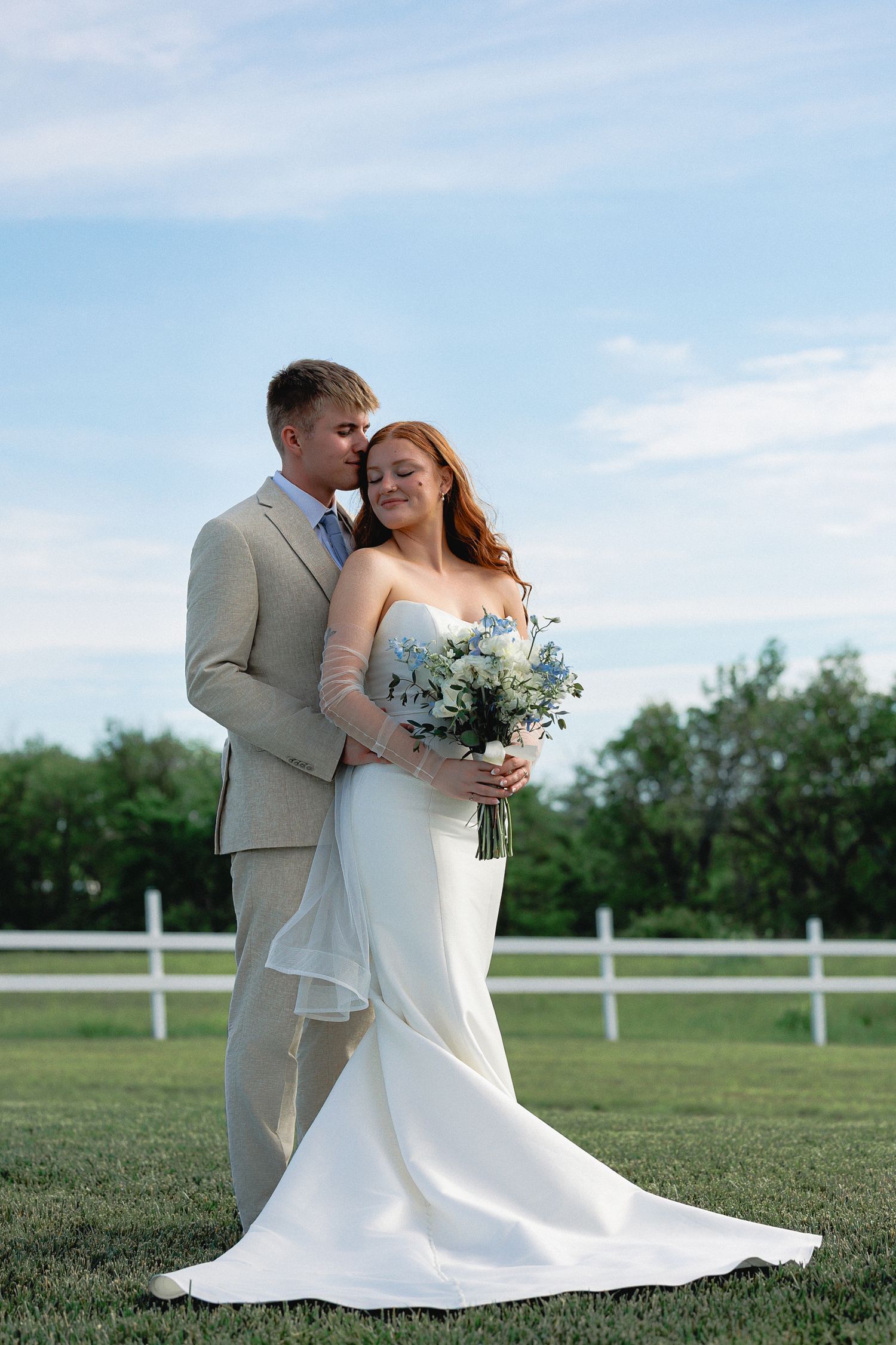 Bride and groom photographed by a Kansas wedding photographer, Temri Photography