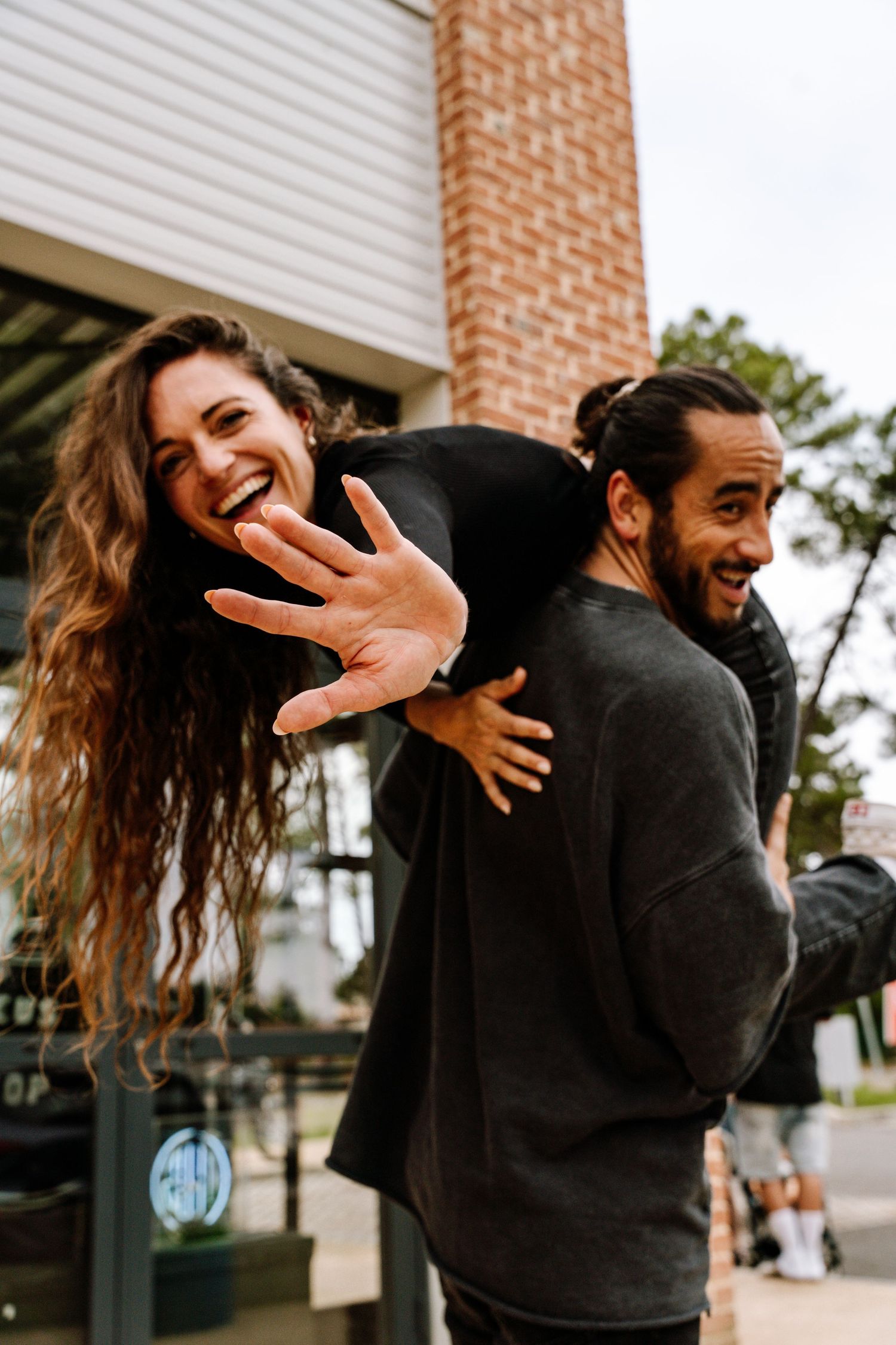 Candid moments of friends laughing and posing together outdoors.