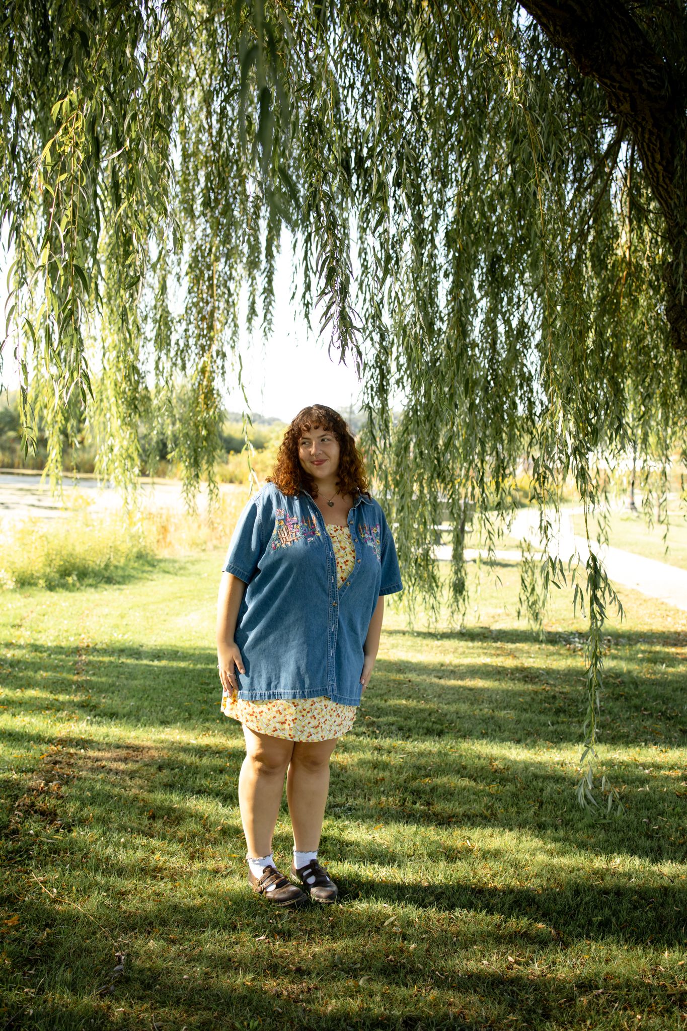 Portrait sequence under willow trees with golden afternoon light.