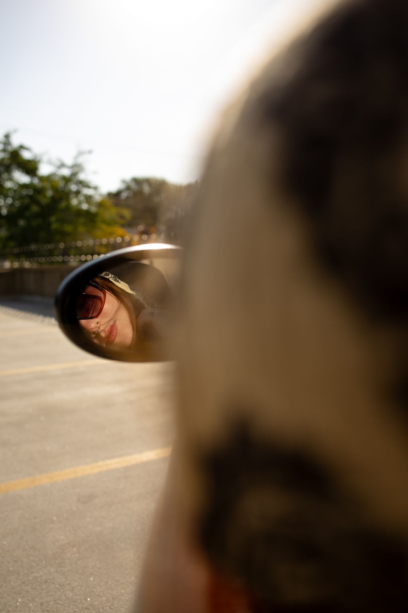 Abstract blurred motion sequence showing movement across a sunny outdoor scene.
