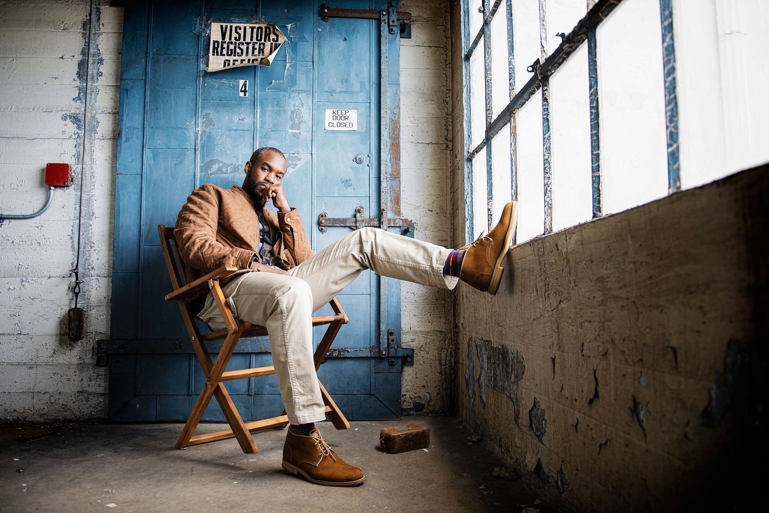 High-quality studio portrait of a man in a modern casual jacket, capturing a confident and approachable look.