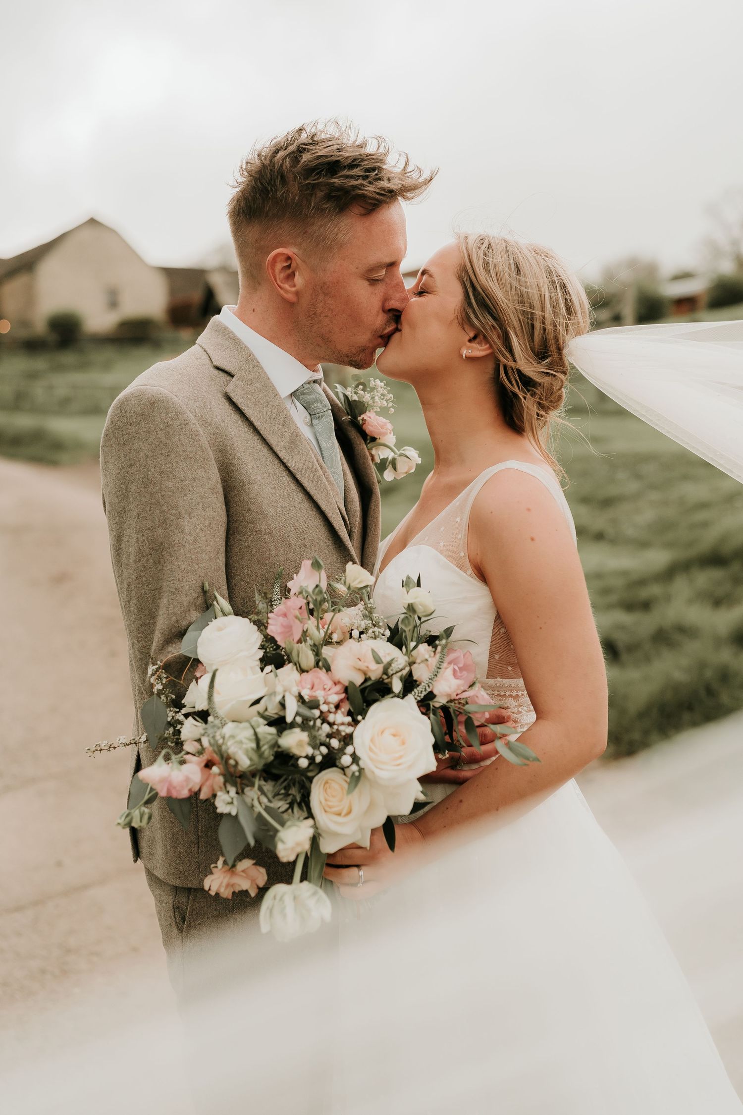 Kingscote Barn wedding with relaxed, natural photography style.
