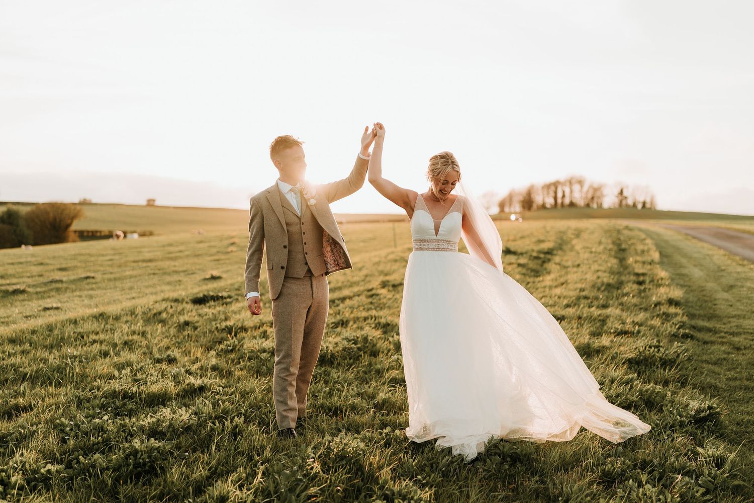 Romantic couple portrait at Kingscote Barn by a Kingscote Barn Wedding Photographer.