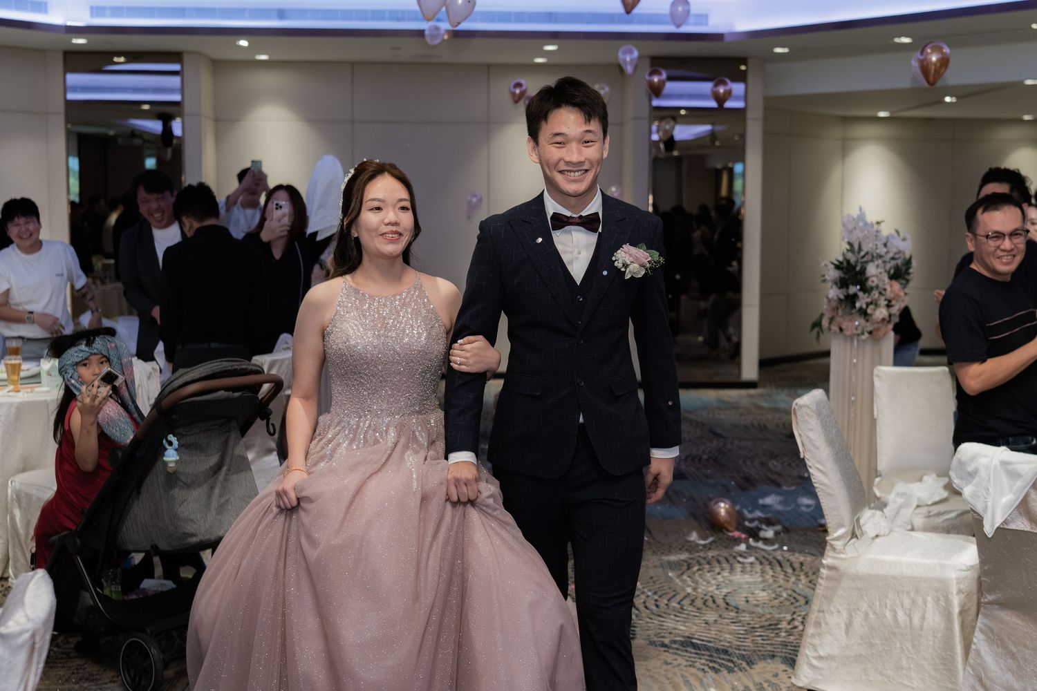 Bride and groom march-in at a Singapore hotel wedding banquet ballroom