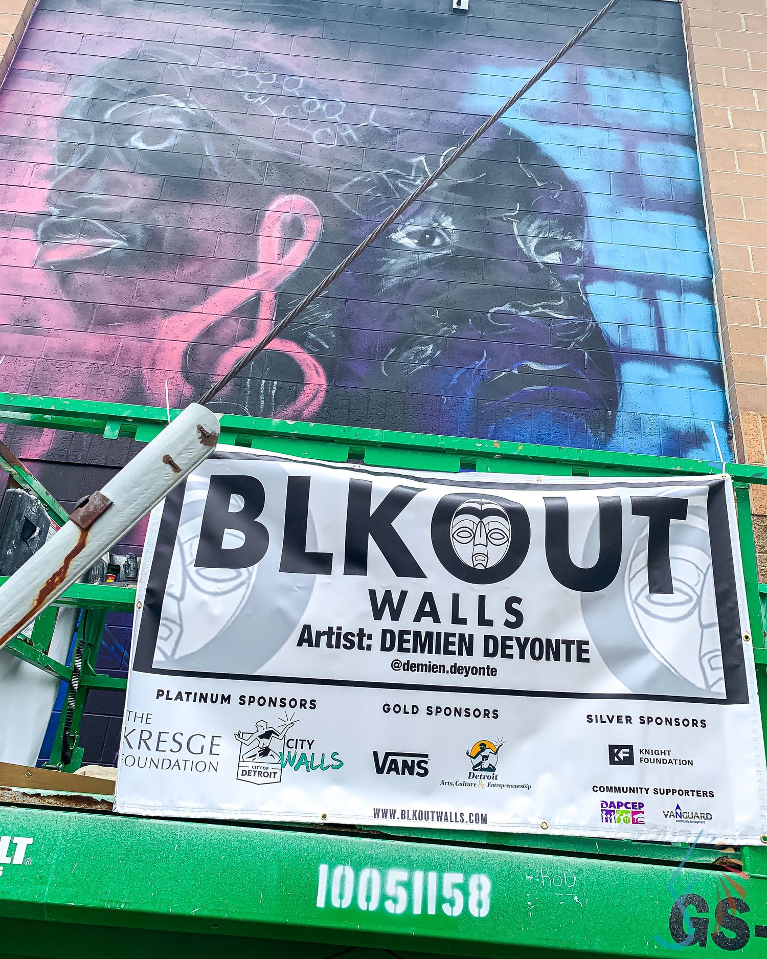 BLKOUT Walls mural by artist Demien Deyonte on a building in Detroit, sponsored by Kresge Foundation and Vans.