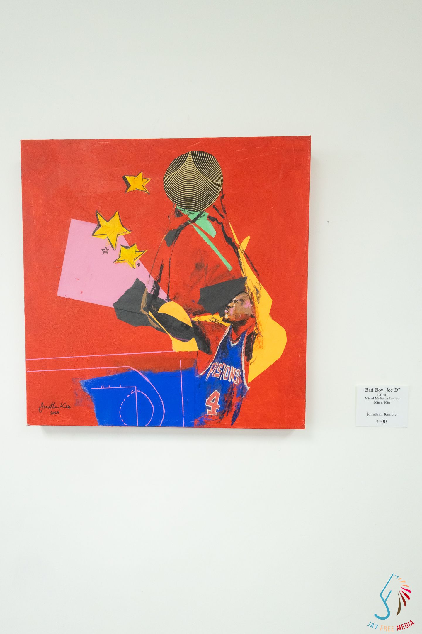 Colorful mixed media painting of basketball player dunking on red background.