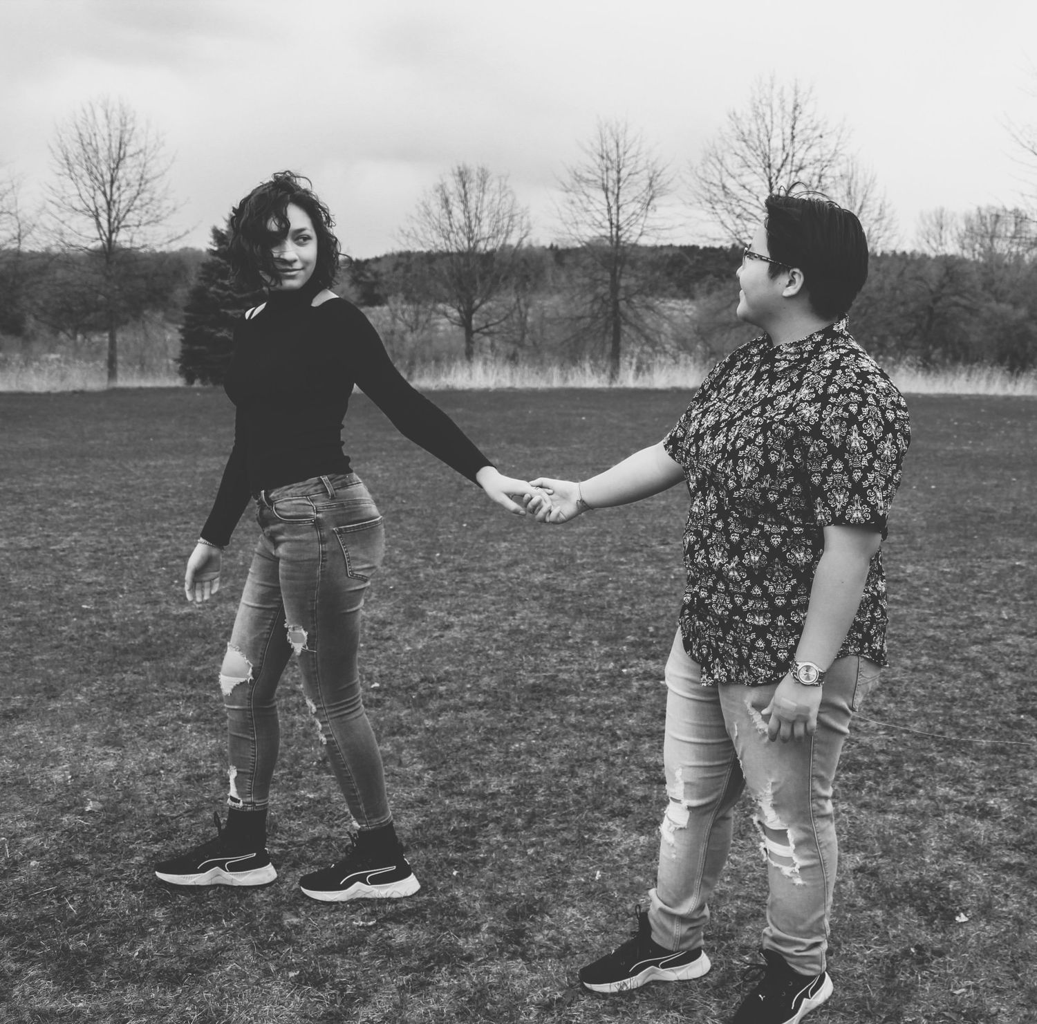 Black and white photo series focusing on legs and feet in an outdoor setting.