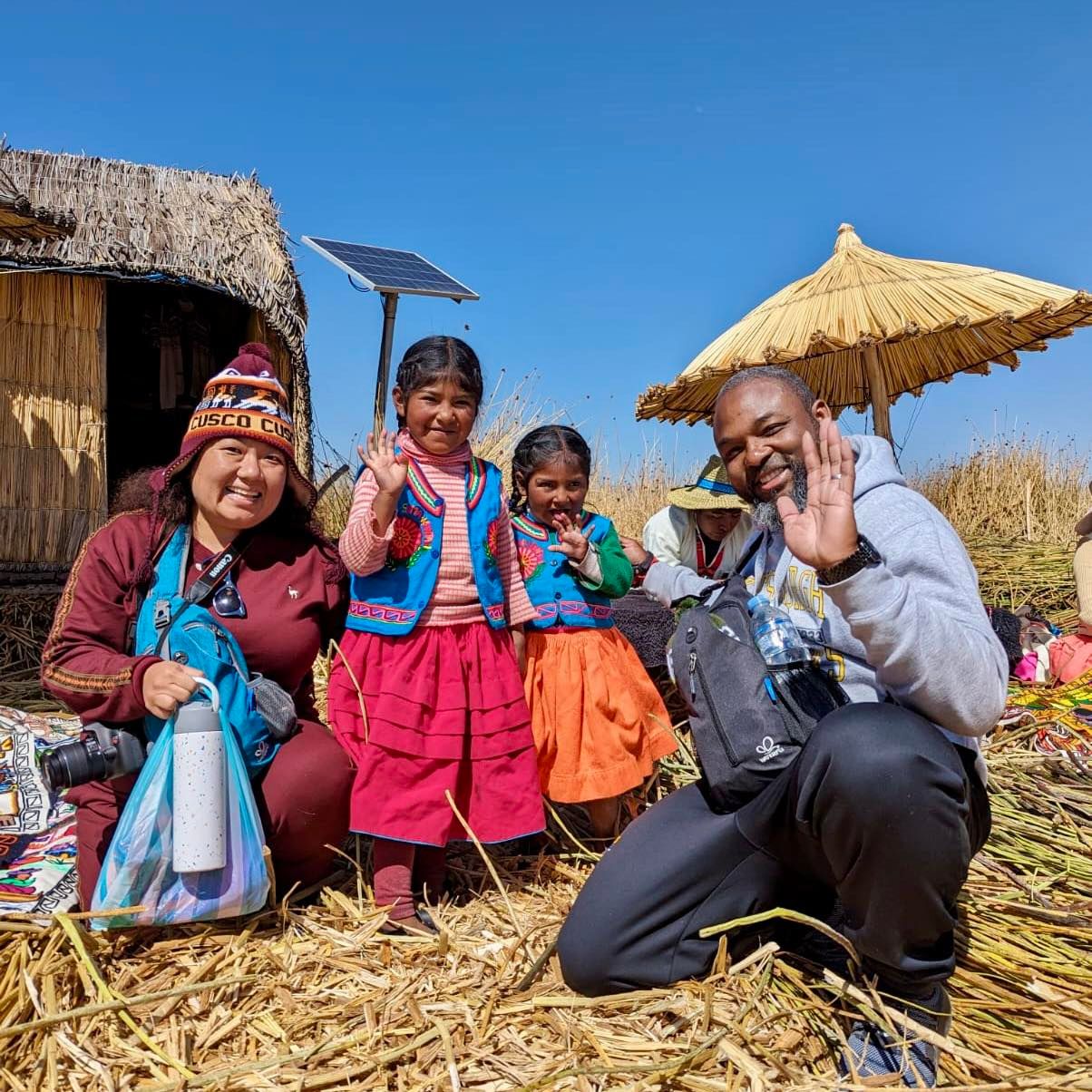 Traditional reed boats and local life on Lake Titicaca's floating islands.