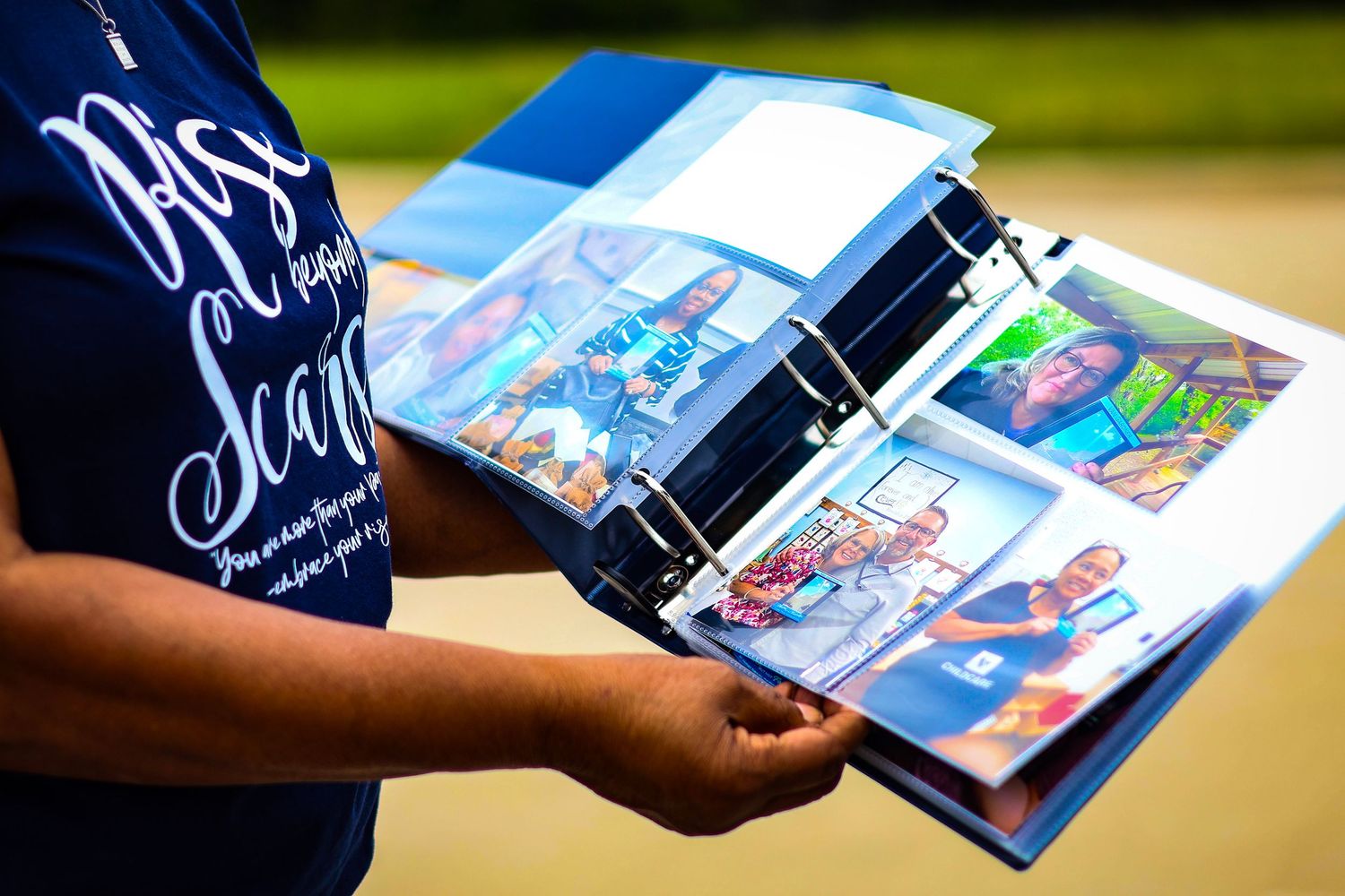 Close-up shots of hands holding and flipping through pages of glossy magazines or brochures in sequence.