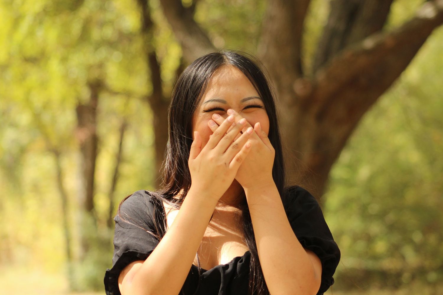 Series of candid reactions showing laughter and surprise in an outdoor setting.