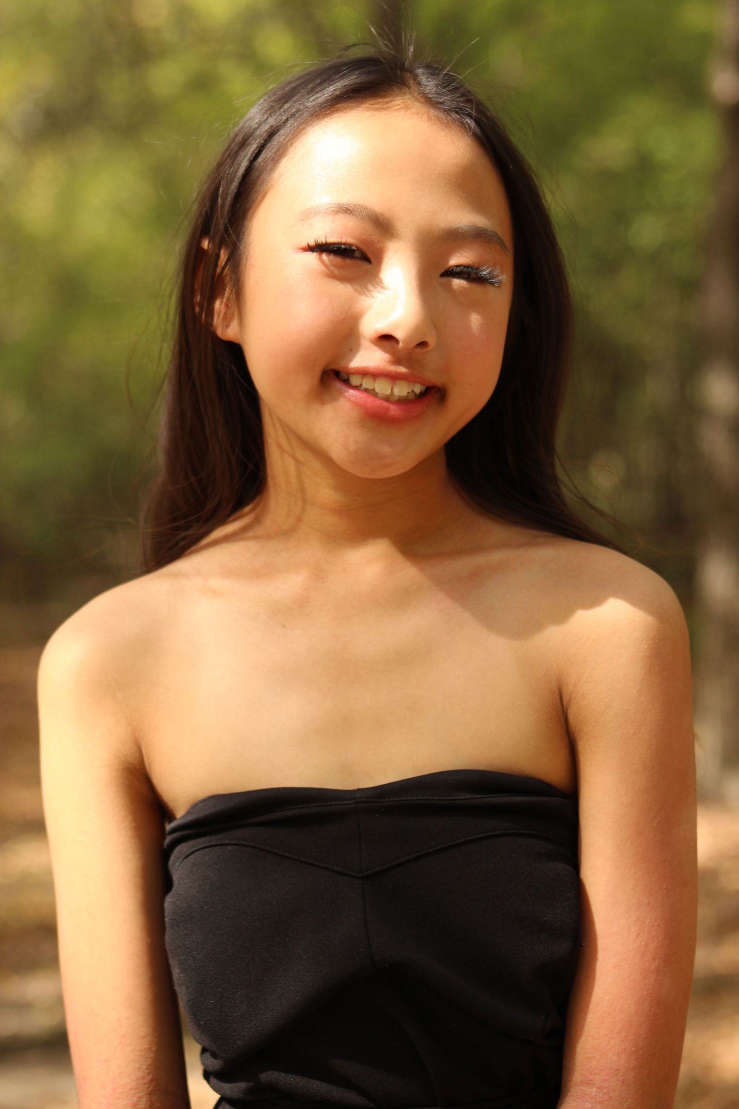 Portrait series showing joyful expressions against a soft autumn background.