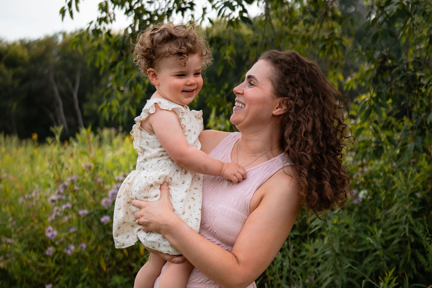 Woman hugging daughter