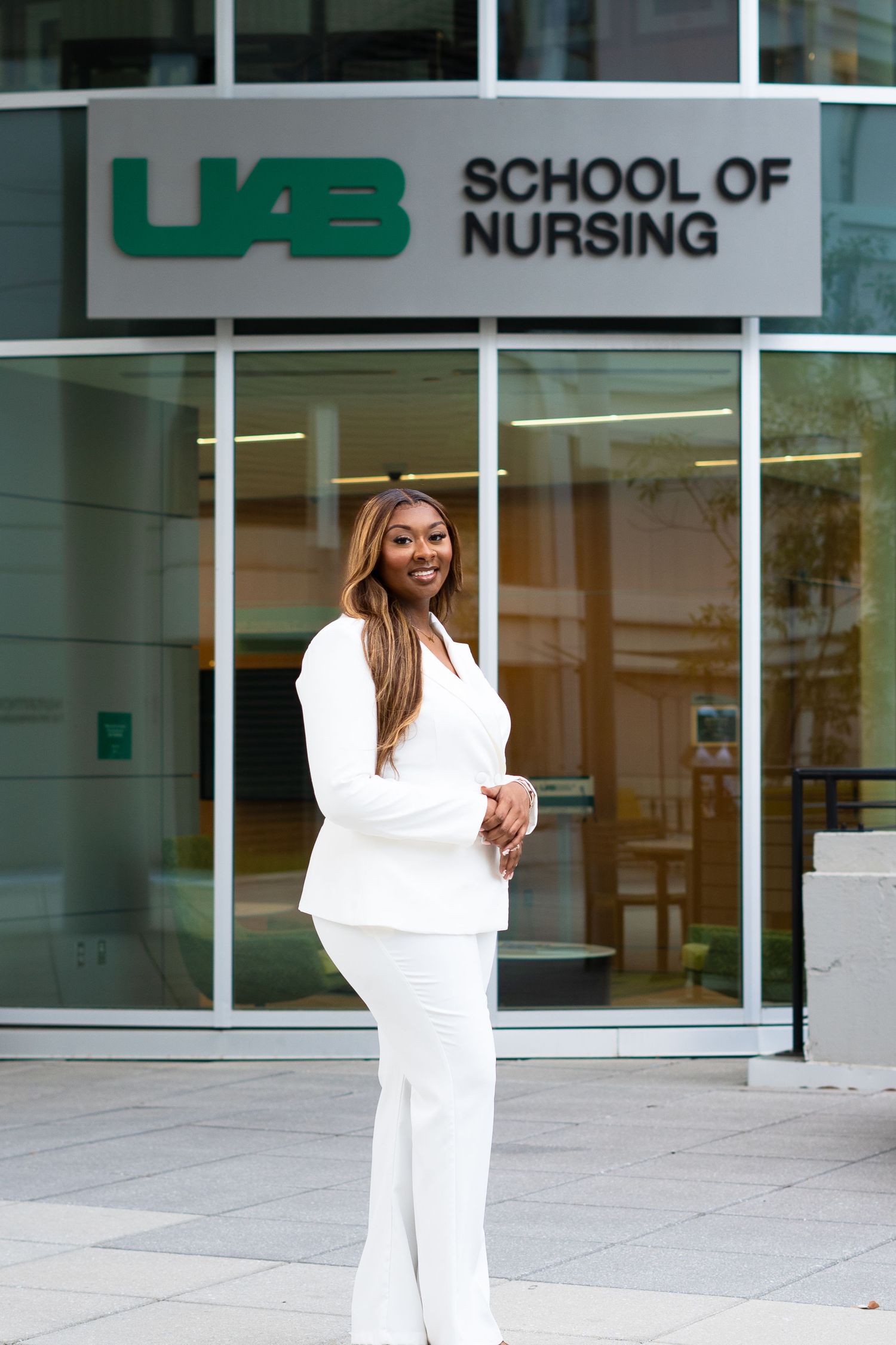 UAB School of Nursing entrance with glass windows and signage.