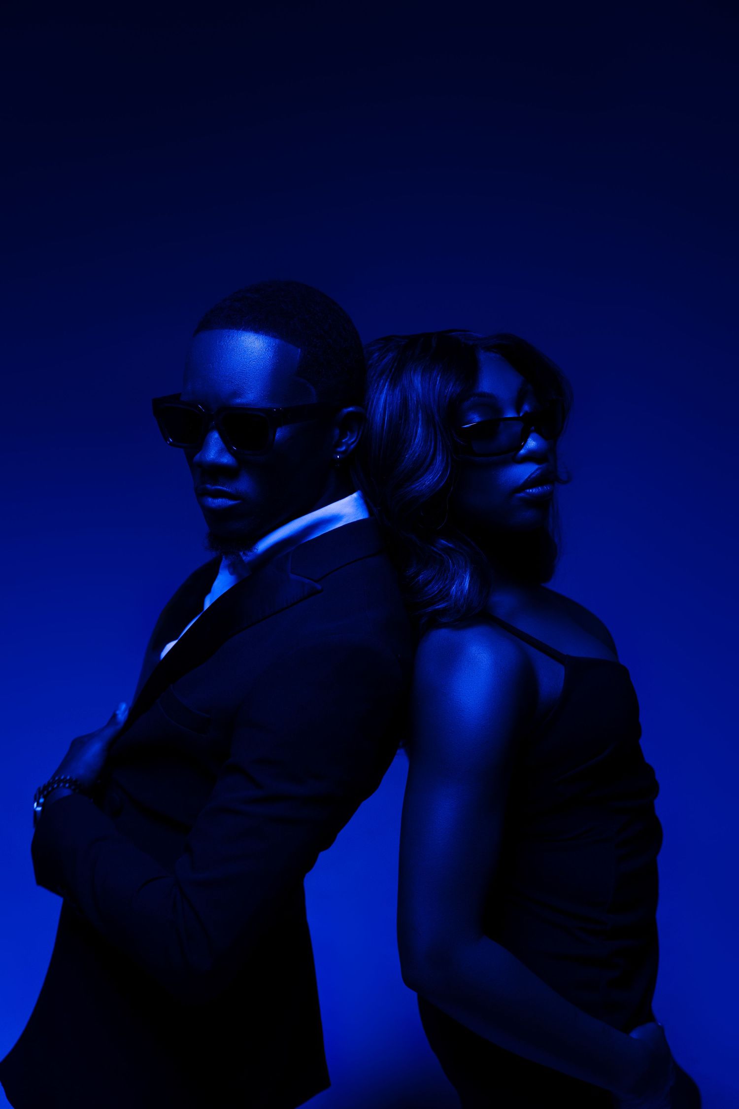 Silhouetted figures in a passionate embrace against a deep blue background create a romantic mood in multiple frames.