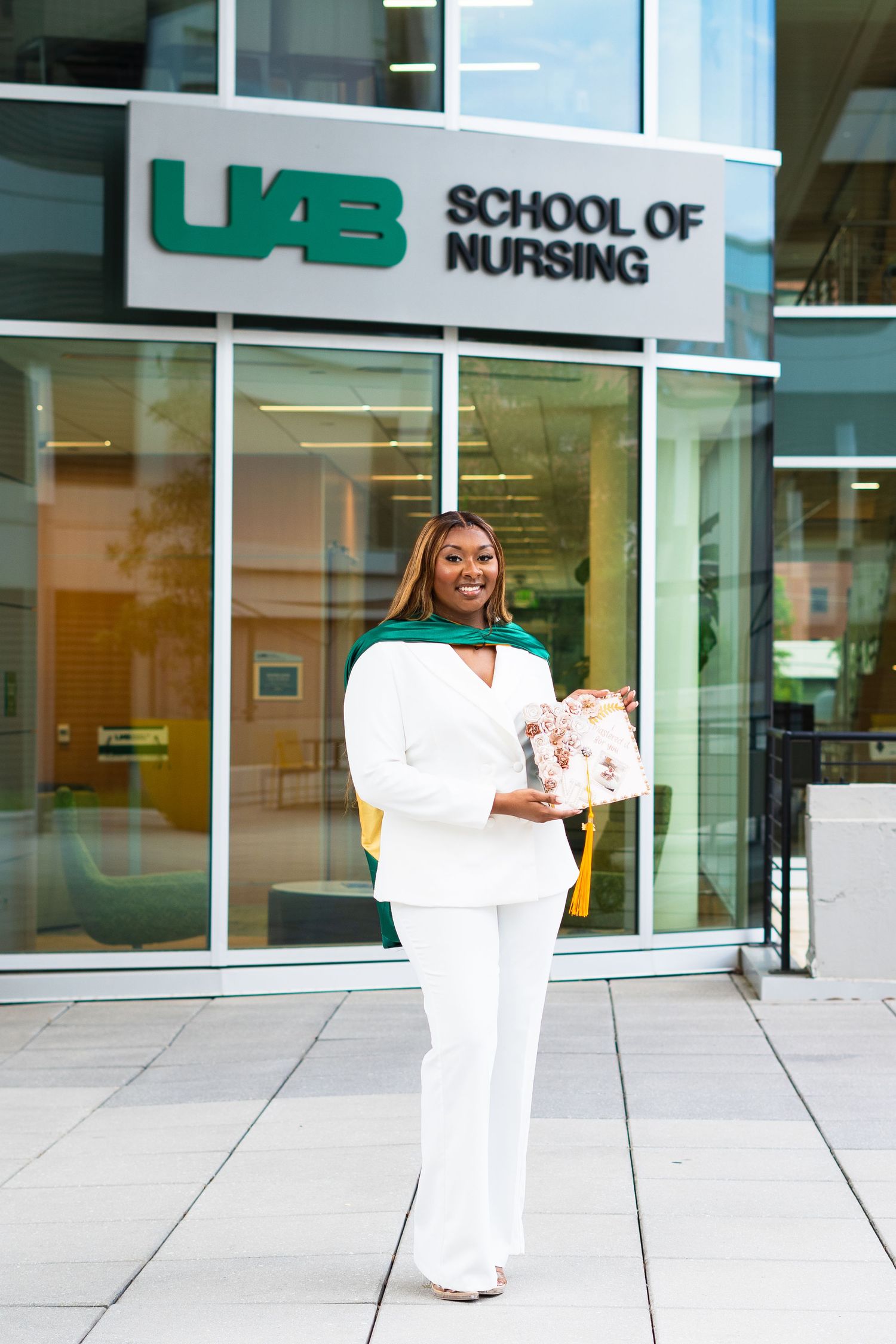 Modern academic building entrance with UAB School of Nursing signage.
