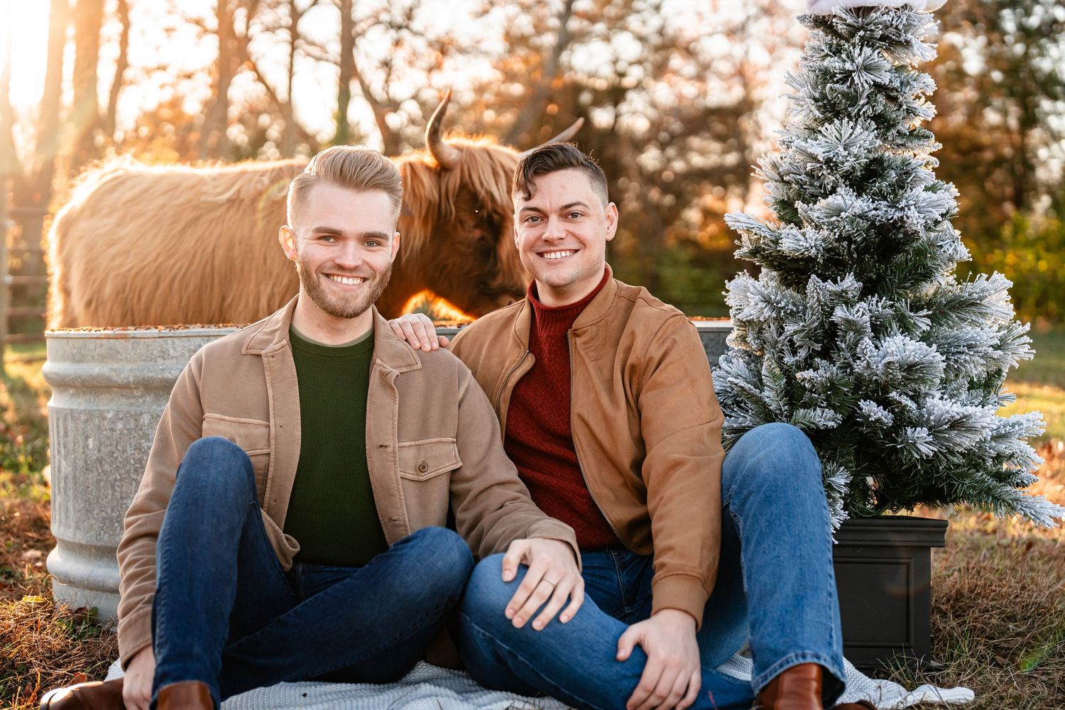 Winter holiday photo session with snow-covered evergreen trees.