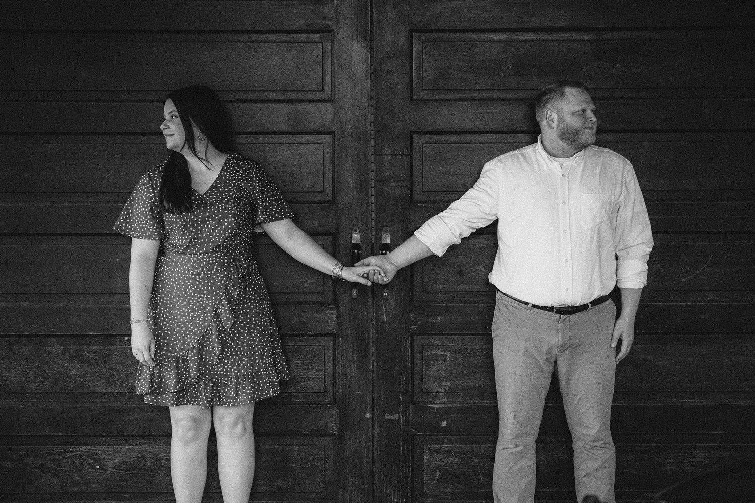 A sequence of playful black and white poses against a wooden wall.