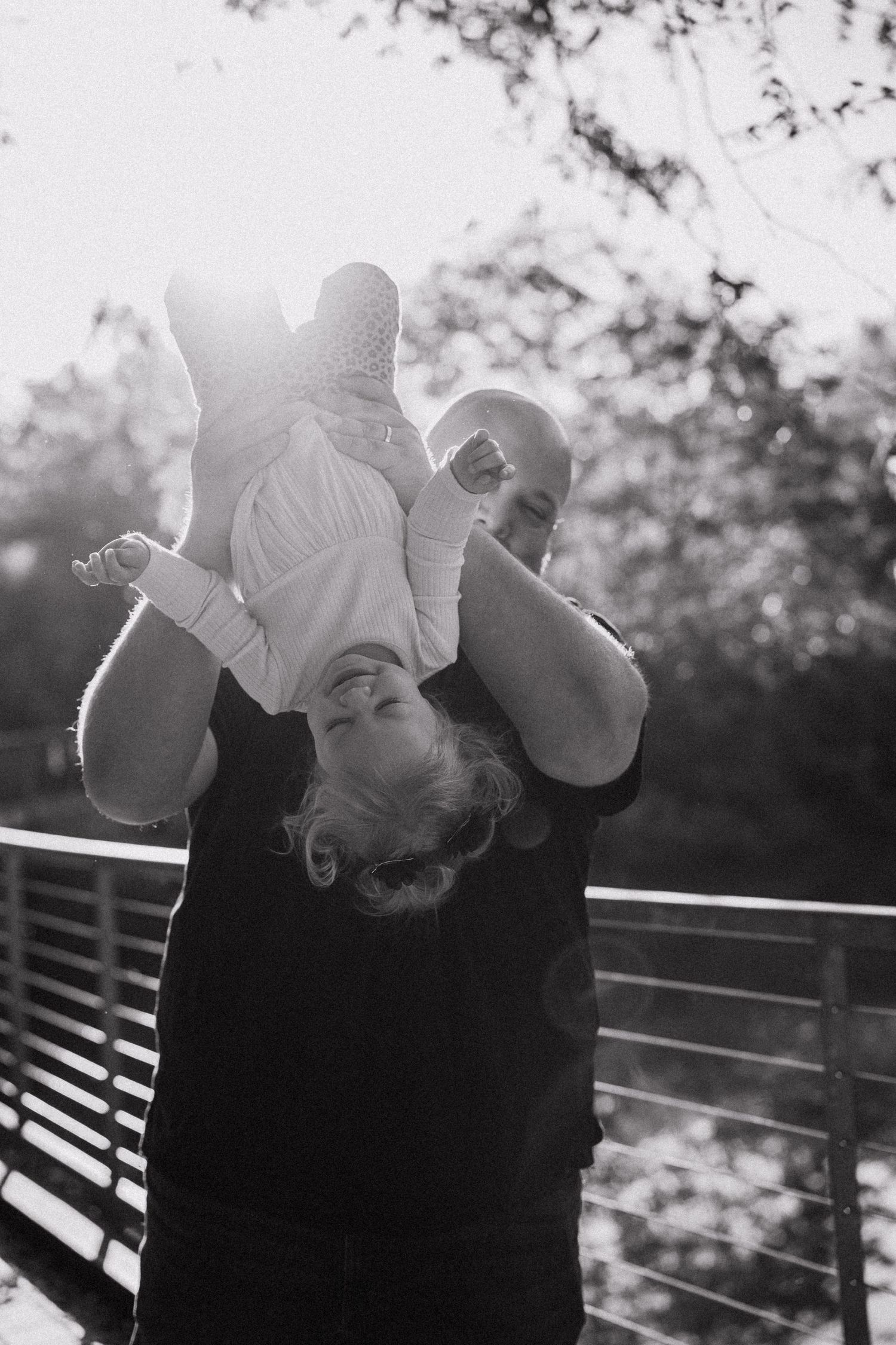 Black and white sequence of playful moments captured in backlit natural lighting.
